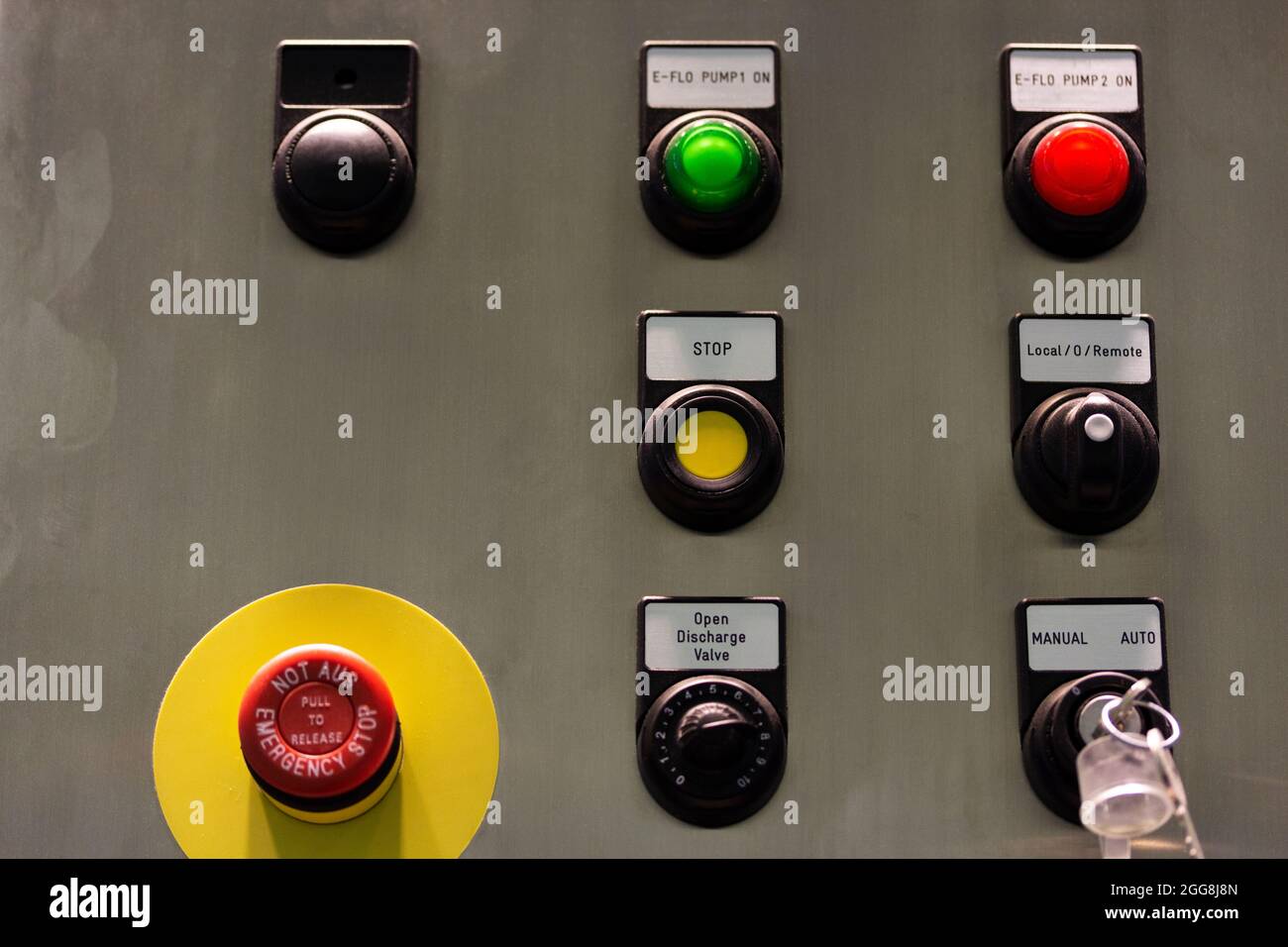 Pushbuttons and switches on the control panel of industrial equipment. Selective focus. Stock Photo