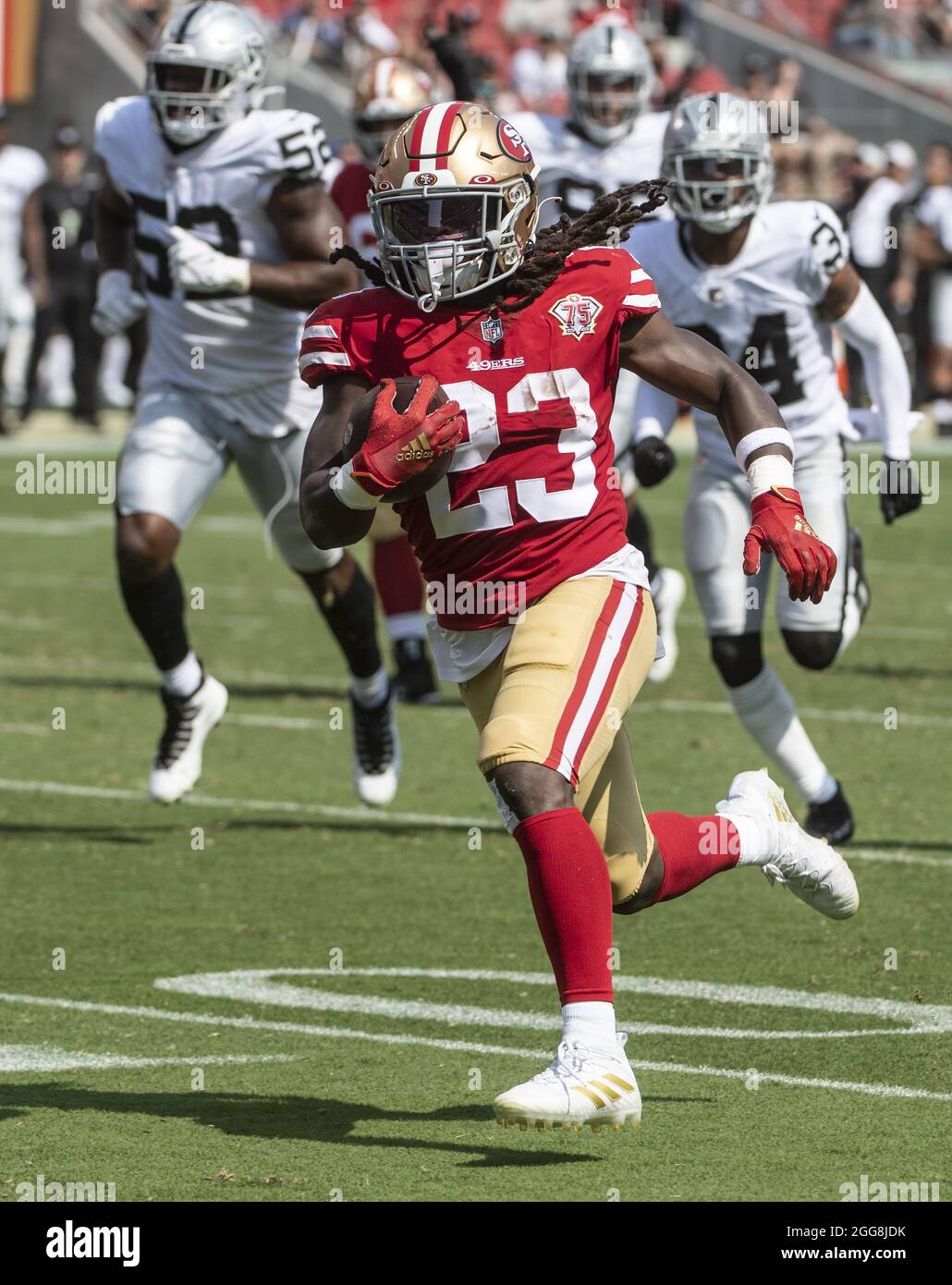 Santa Clara, United States. 29th Aug, 2021. San Francisco 49ers running  back JaMycal Hasty (23) runs 35 yards for a third quarter TD against the  Las Vegas Raiders at Levi's Stadium in