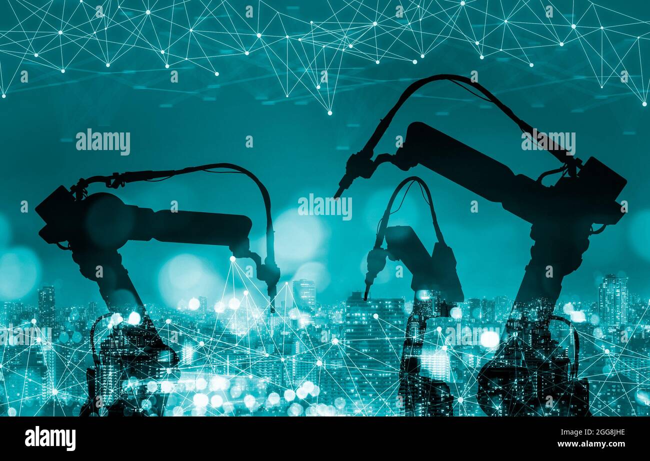 Mechanized industry of future factory double exposure image . Concept of robotics technology for industrial revolution and automated manufacturing Stock Photo