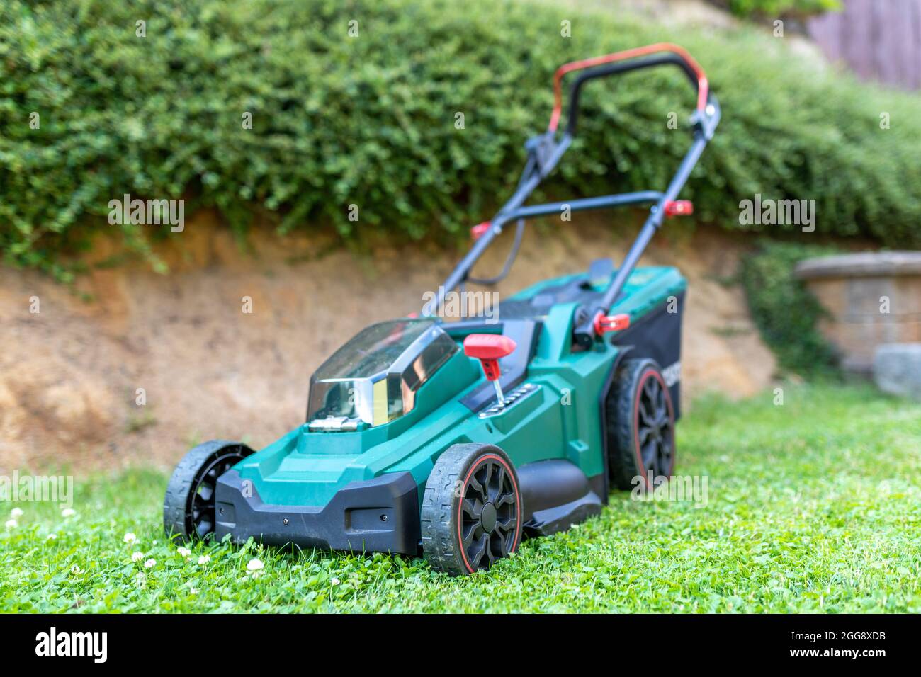 Electric lawn mowers hi res stock photography and images Alamy