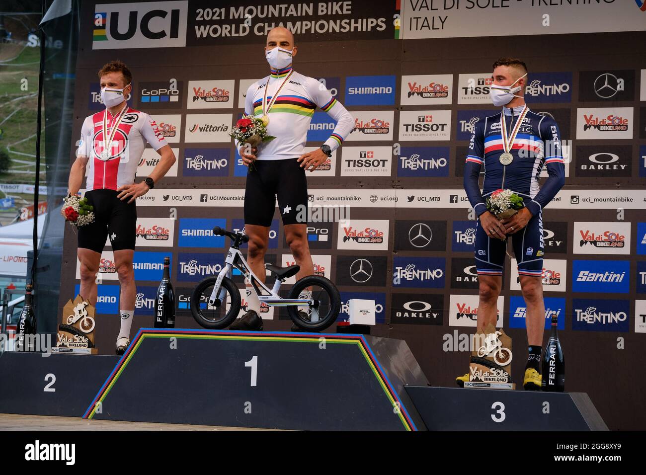 Commezzadura, Italy. 28th Aug, 2021. Podium of UCI MTB Elite man World  Championships in Val di Sole (Italy): gold metal for (2) - Nino Schurter  (Switzerland), silver metal (3) - Mathias Flueckiger (