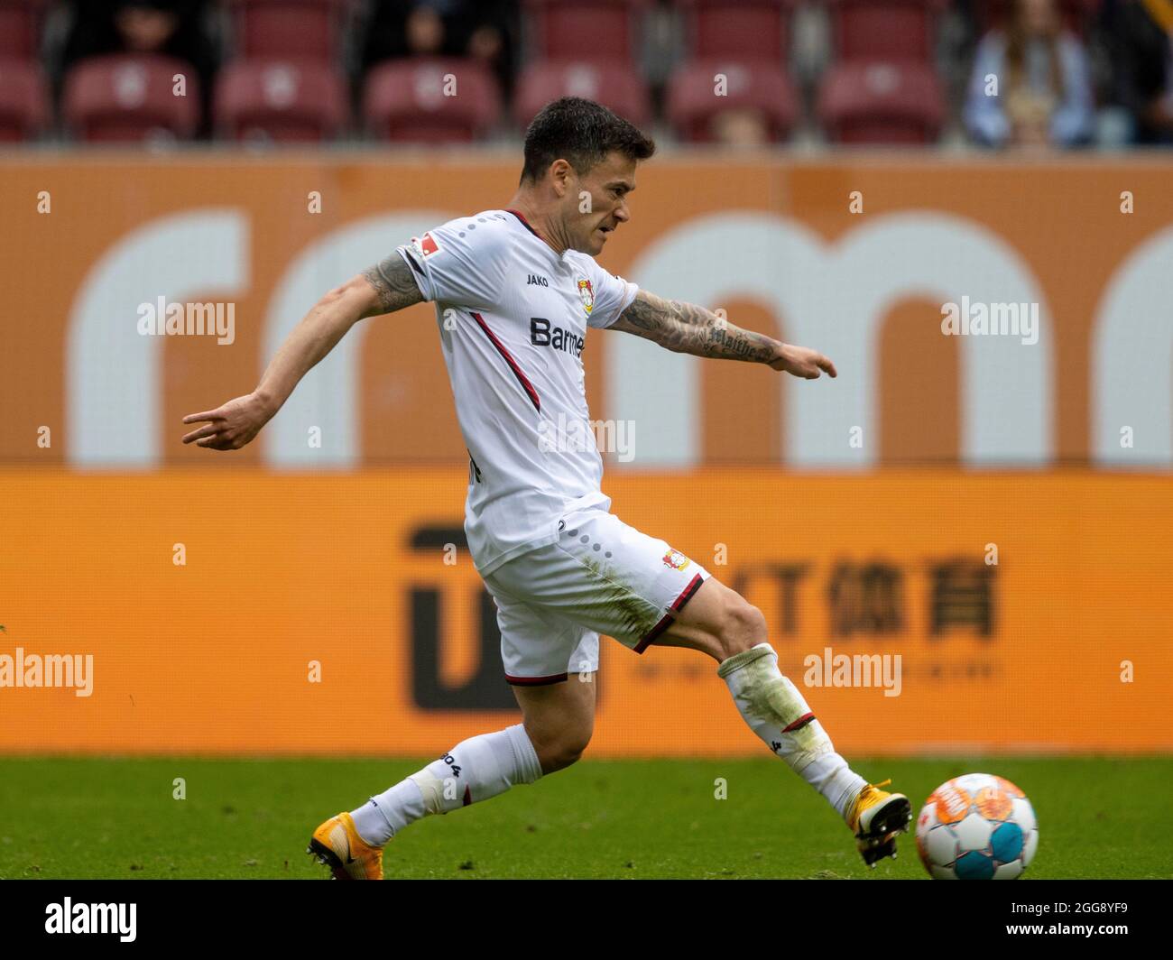 Charles ARANGUIZ (# 20, LEV). Soccer, FC Augsburg - Bayer 04 Leverkusen 1: 4, Soccer Bundesliga, 3rd matchday, season 2021-2022, on August 28, 2021 in Augsburg, WWKARENA, Germany. DFL regulations prohibit any use of photographs as image sequences and/or quasi-video. ¬ Stock Photo