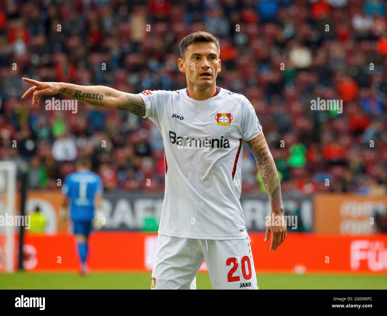 Charles ARANGUIZ (# 20, LEV). Soccer, FC Augsburg - Bayer 04 Leverkusen 1: 4, Soccer Bundesliga, 3rd matchday, season 2021-2022, on August 28, 2021 in Augsburg, WWKARENA, Germany. DFL regulations prohibit any use of photographs as image sequences and/or quasi-video. ¬ Stock Photo