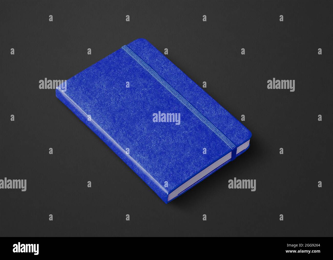 Marine blue closed notebook mockup isolated on black Stock Photo