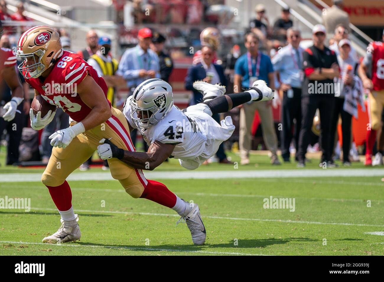 Santa Clara, United States. 29th Aug, 2021. San Francisco 49ers tight end  Charlie Woerner (89) is tackled by Las Vegas Raiders safety Divine Deablo  (49) during the first half at Levi's Stadium,