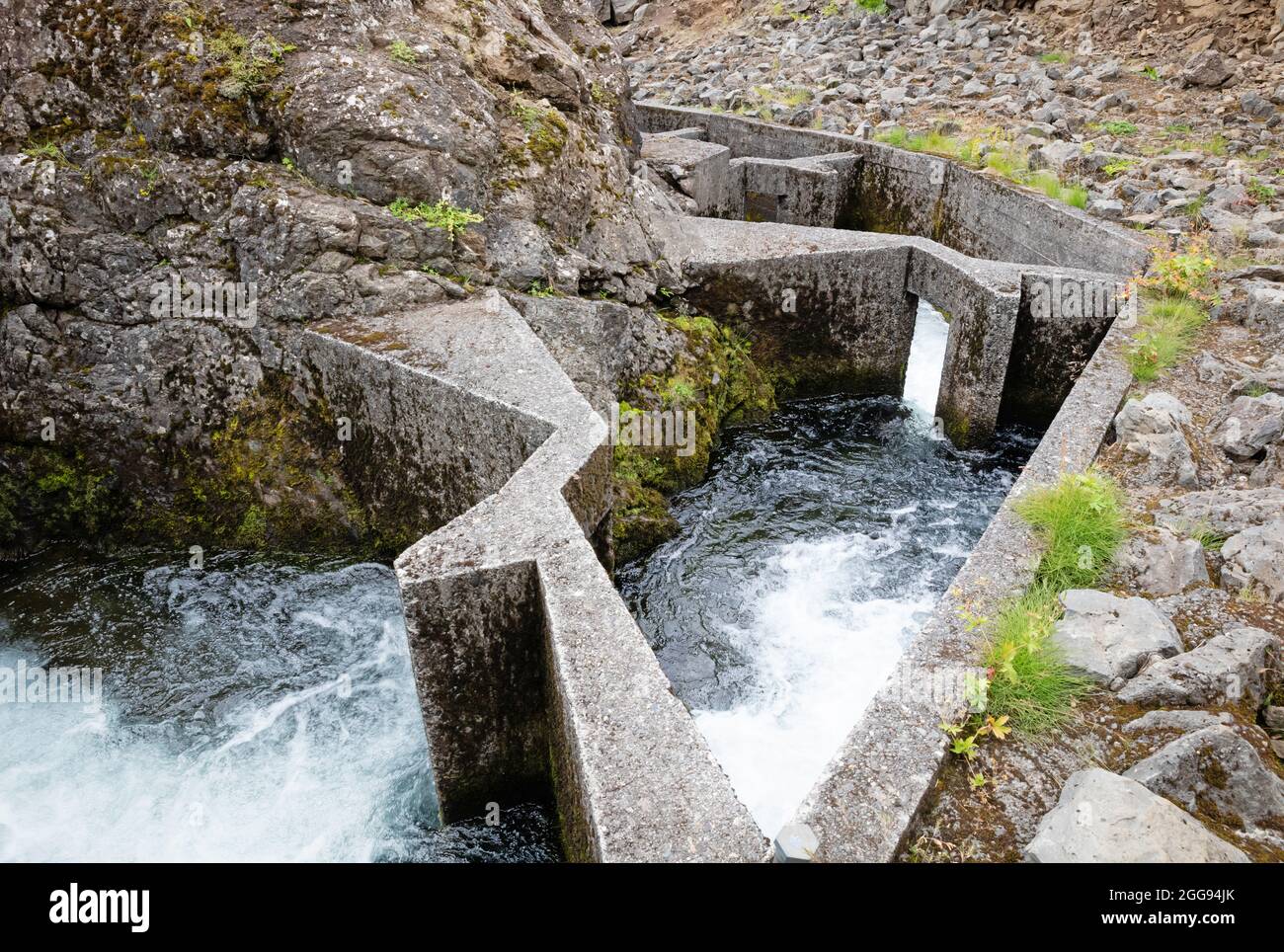 View on a large concrete Salmon Ladder at an Icelandic waterfall ...