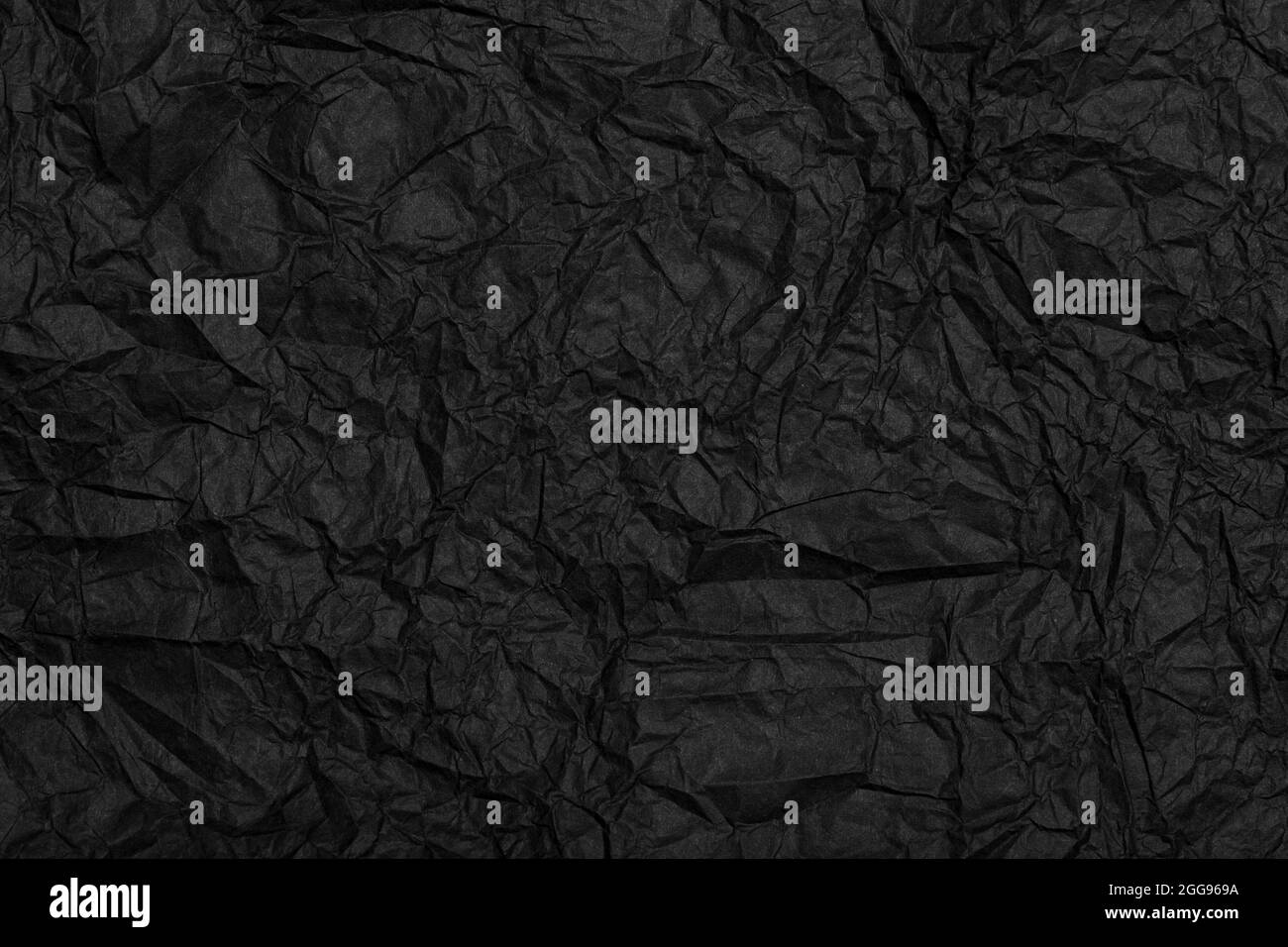 Black crafted recycled paper with texture and wrinkled effect. Black