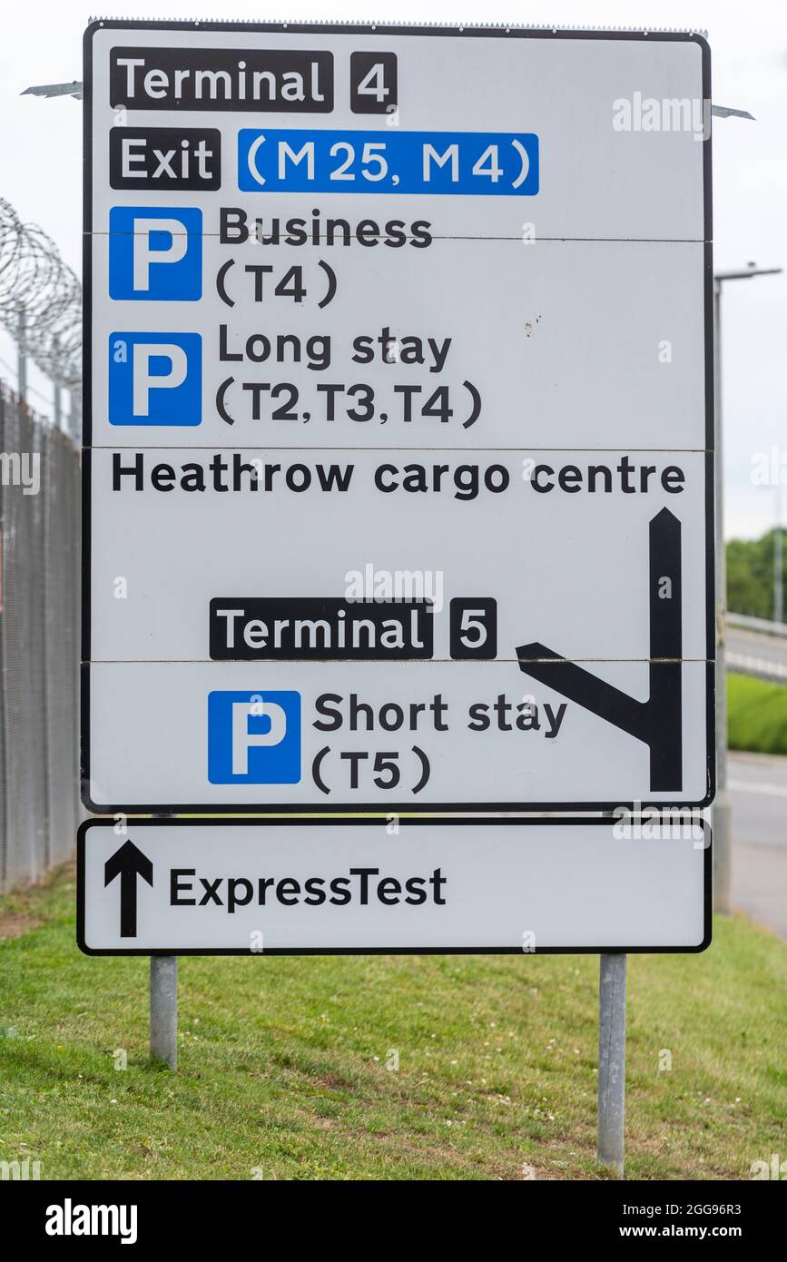COVID 19 Express Test sign at London Heathrow Airport. ExpressTest direction sign neat Terminal 5 and 4, with business. long stay car park and cargo Stock Photo