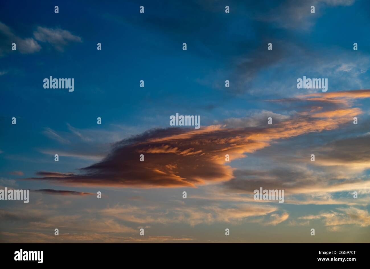 Sunset sky with orange clouds. Nature background Stock Photo - Alamy