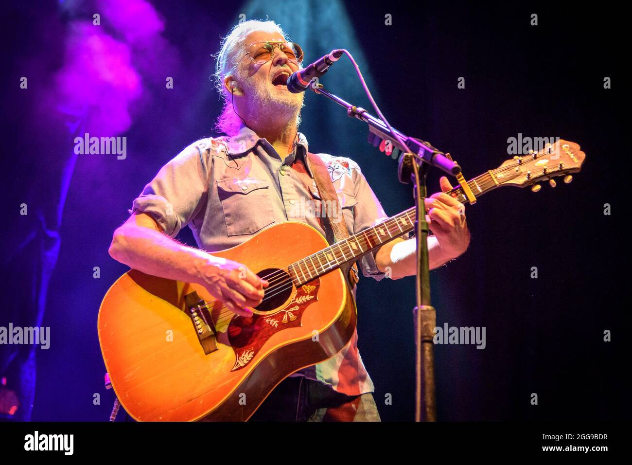 Toronto, Canada. 28th Aug, 2021. Greg Keelor, lead guitarist of the Canadian country rock band BLUE RODEO performing at a "Sold Out Show" at the Budweiser Stage in Toronto, Canada. Credit: SOPA Images Limited/Alamy Live News Stock Photo