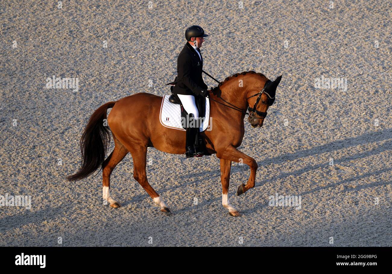 Belgium’s Kevin Van Ham riding Eros Van Ons Heem competes in the Equestrian Dressage Individual Freestyle Test - Grade V at the Equestrian Park during day six of the Tokyo 2020 Paralympic Games in Japan. Picture date: Monday August 30, 2021. Stock Photo