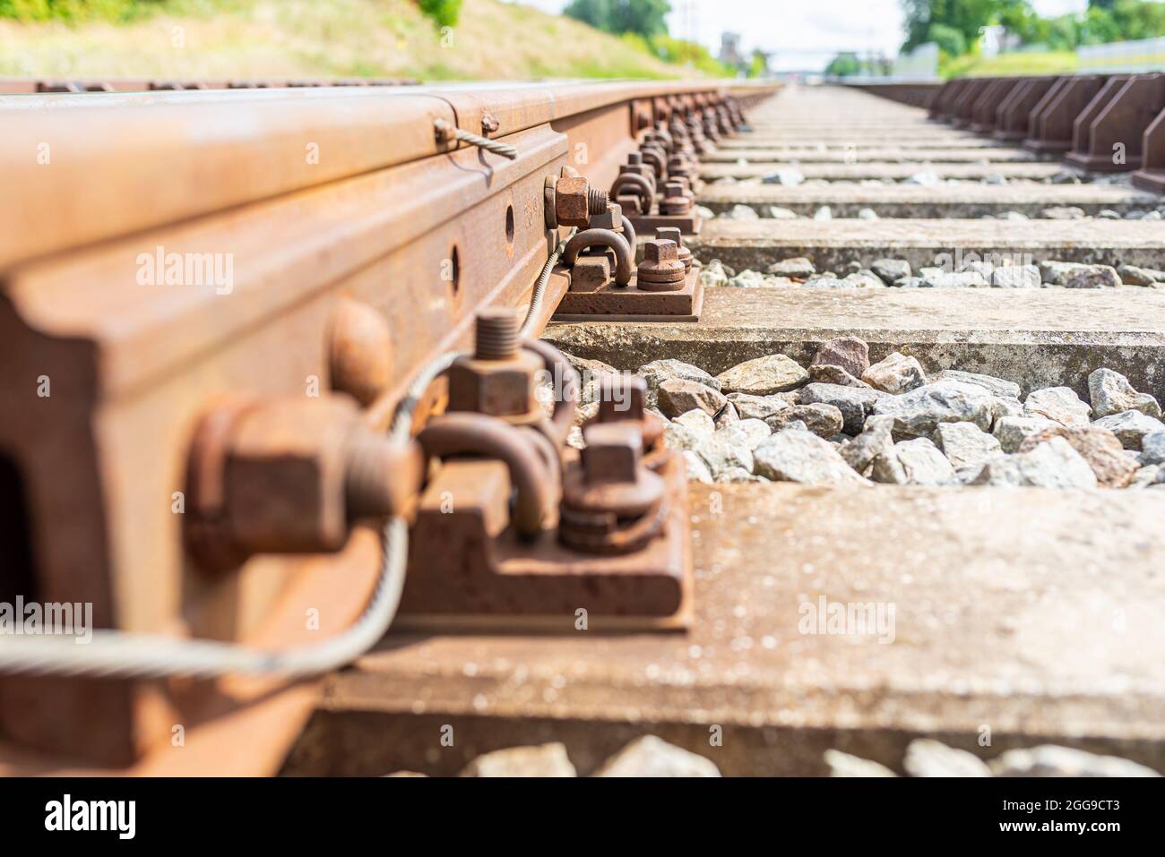 Railway track details closeup photo with selective focus.Closeup view