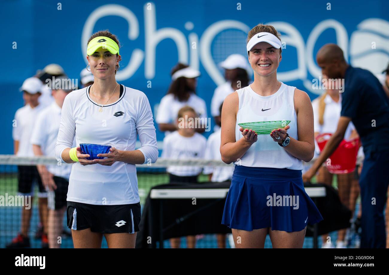 alize-cornet-of-france-elina-svitolina-of-the-ukraine-with-their-trophies-after-the-final-of-the-2021-wta-chicago-womens-open-wta-250-tennis-tournament-on-august-28-2021-in-chicago-united-states-photo-rob-prange-spain-dppi-dppi-2GG9D04.jpg