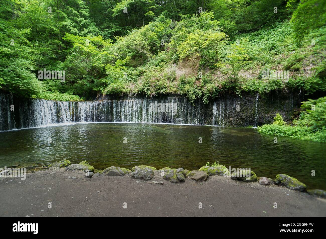 Closeup Shot Of A Beautiful Karuizawa Shiraito Waterfall In Japan Among Green Trees Stock Photo Alamy