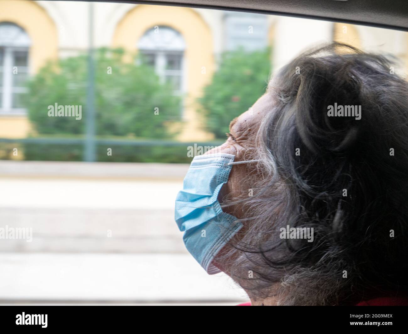 Elderly female mask traveling hi-res stock photography and images - Alamy