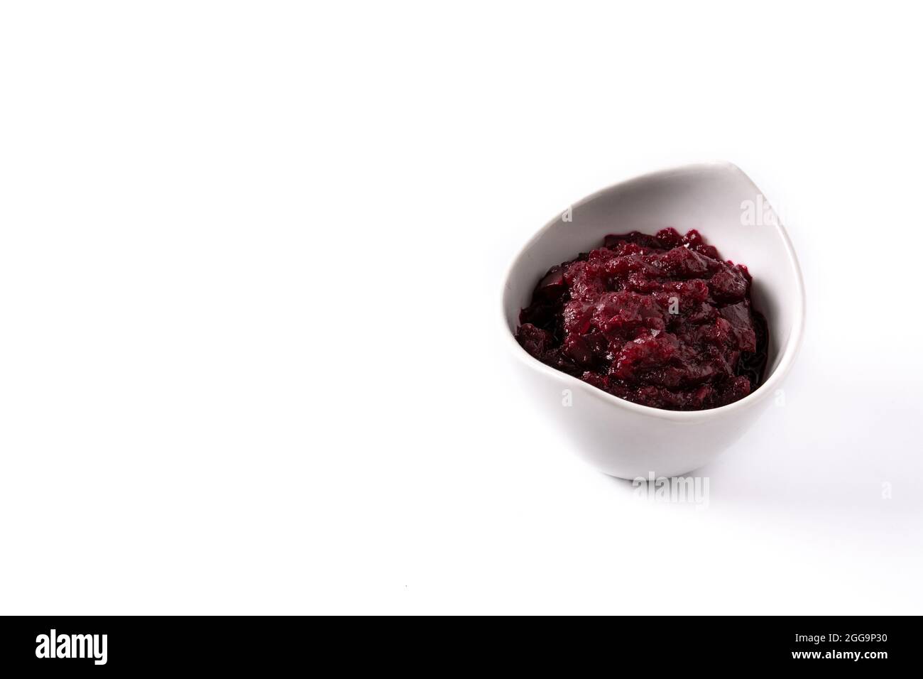 Beetroot sauce in white bowl isolated on white background Stock Photo