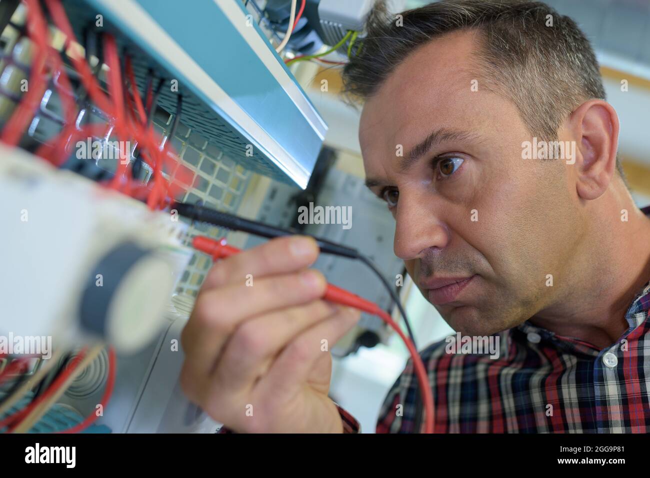 electrical engineer testing the power Stock Photo Alamy