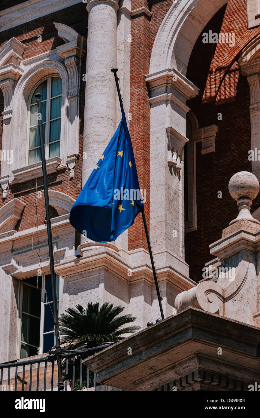Close up of European Union EU flag in front of a building in Rome, Italy on a sunny day Stock Photo