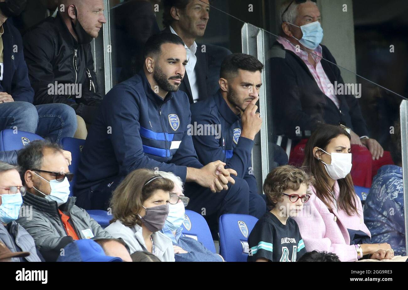 New recruits of Troyes Adil Rami and Xavier Chavalerin attend the French championship Ligue 1 football match between ESTAC Troyes and AS Monaco (ASM) on August 29, 2021 at Stade de L'Aube in Troyes, France - Photo Jean Catuffe / DPPI Stock Photo