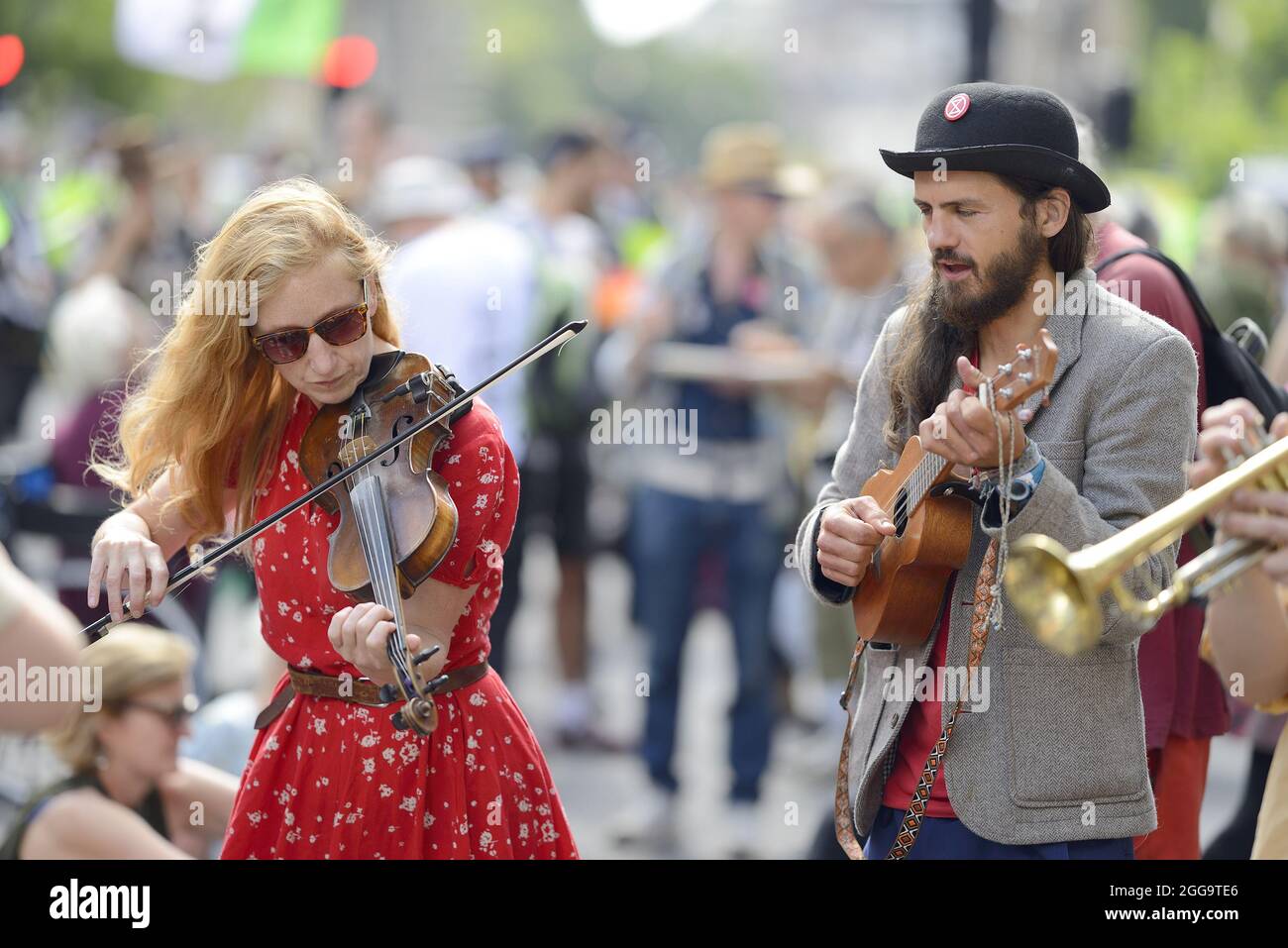 London, England, UK. Musician playing at an Extinction Rebellion protest in Whitehall, 24th August 2021 Stock Photo