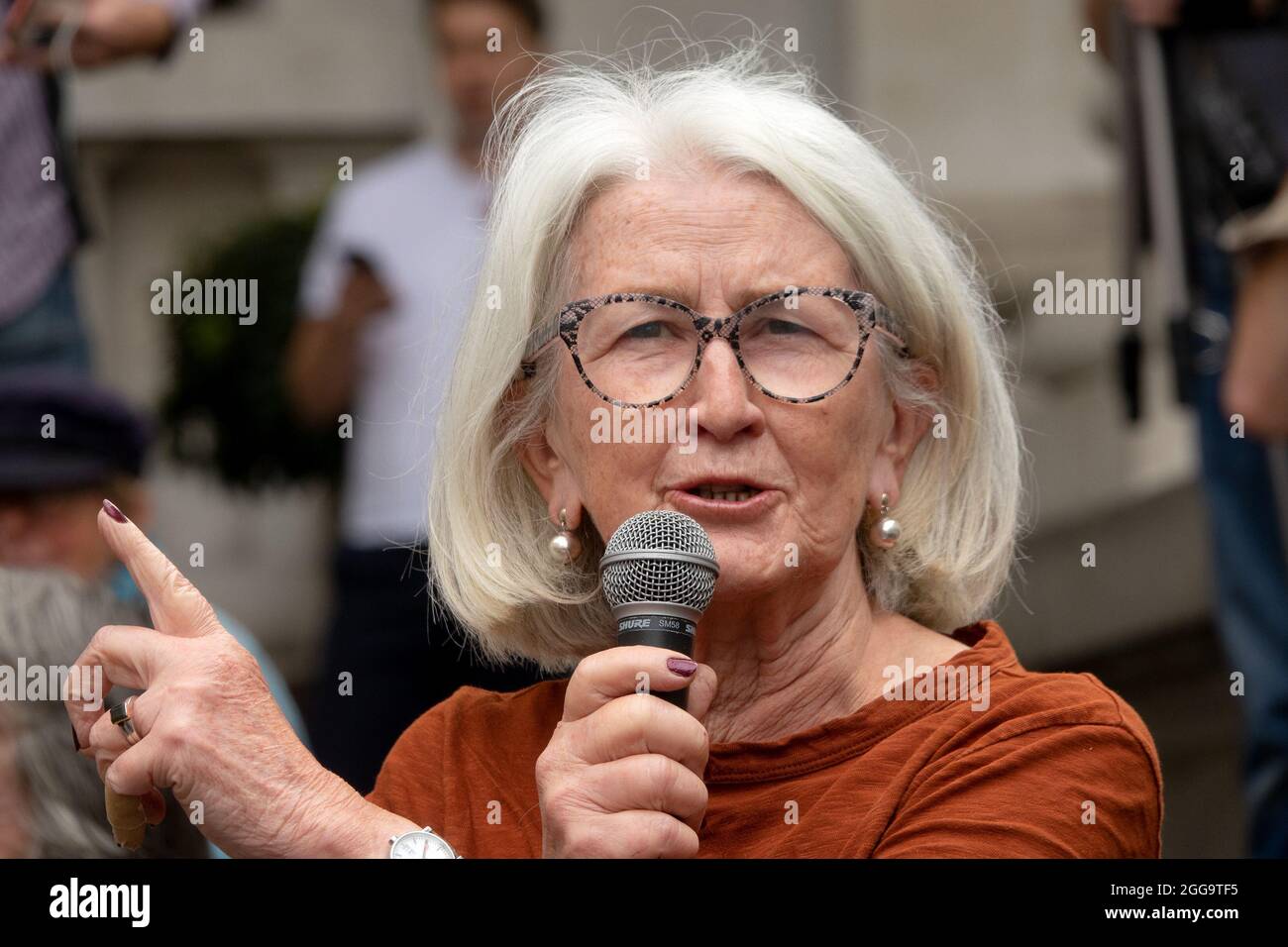 Ann Pettifor - economist and authour - speaking at an Extinction Rebellion demostration at the Bank of England, 27th August 2021 Stock Photo