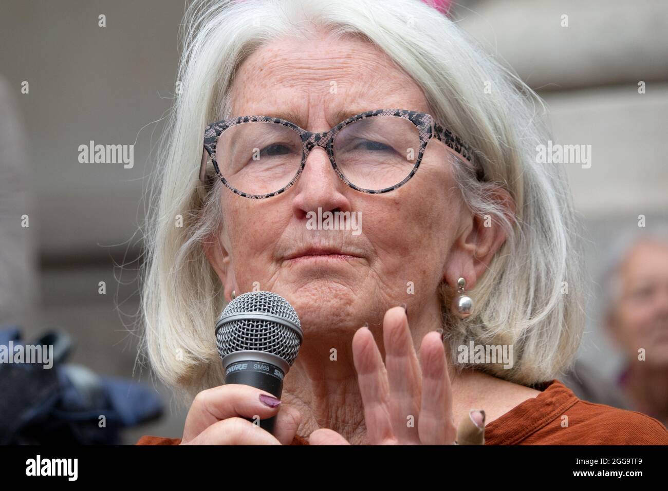 Ann Pettifor - economist and authour - speaking at an Extinction Rebellion demostration at the Bank of England, 27th August 2021 Stock Photo