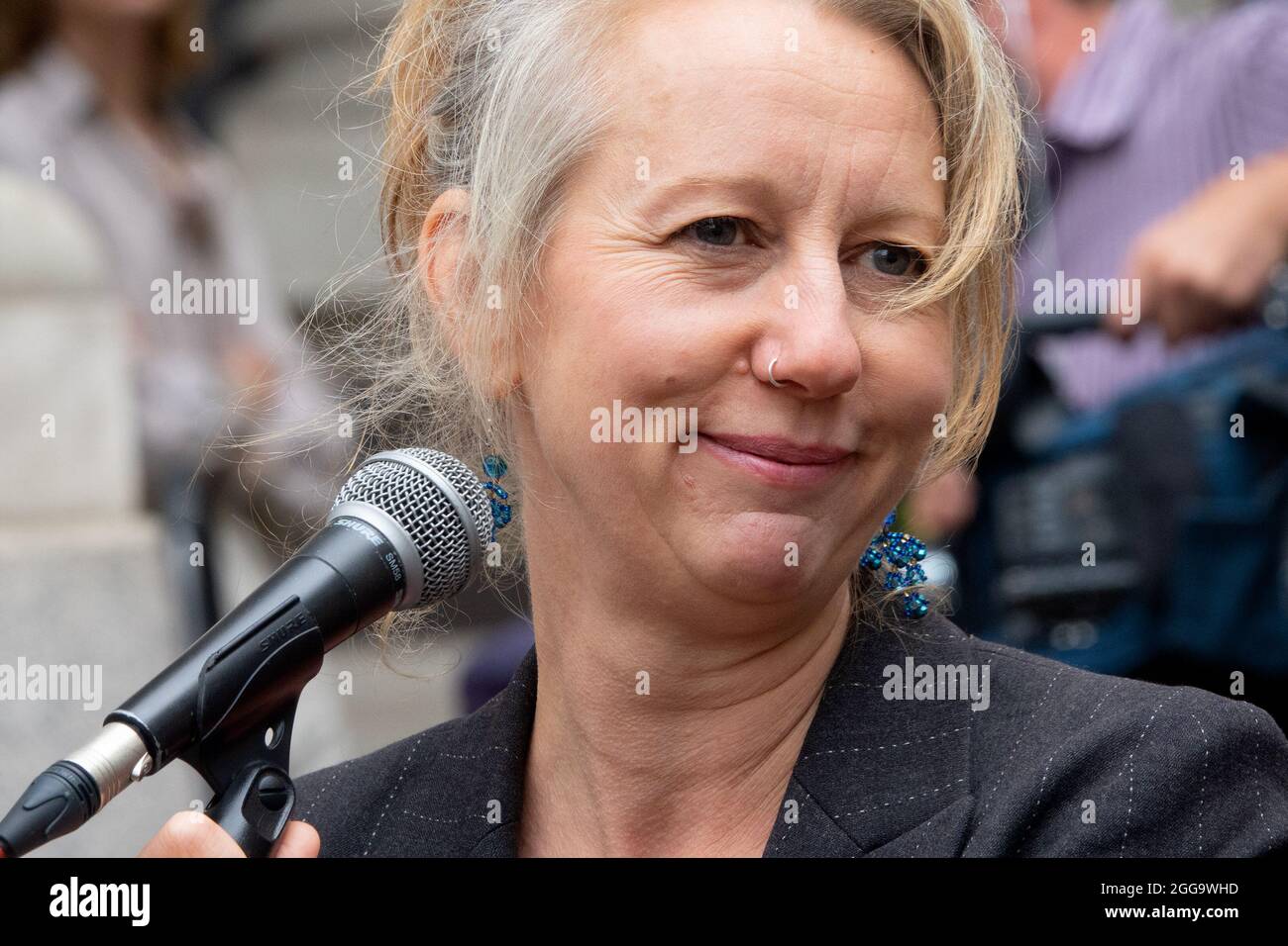 Gail Bradbrook - environmental activist and a co-founder of Extinction Rebellion - speaking at an XR demostration at the Bank of England, 27th August Stock Photo