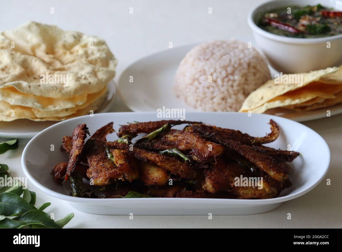 Nattholy Fish Crispy and spicy Anchovy fry. Anchovies marinated with spices and deep ...