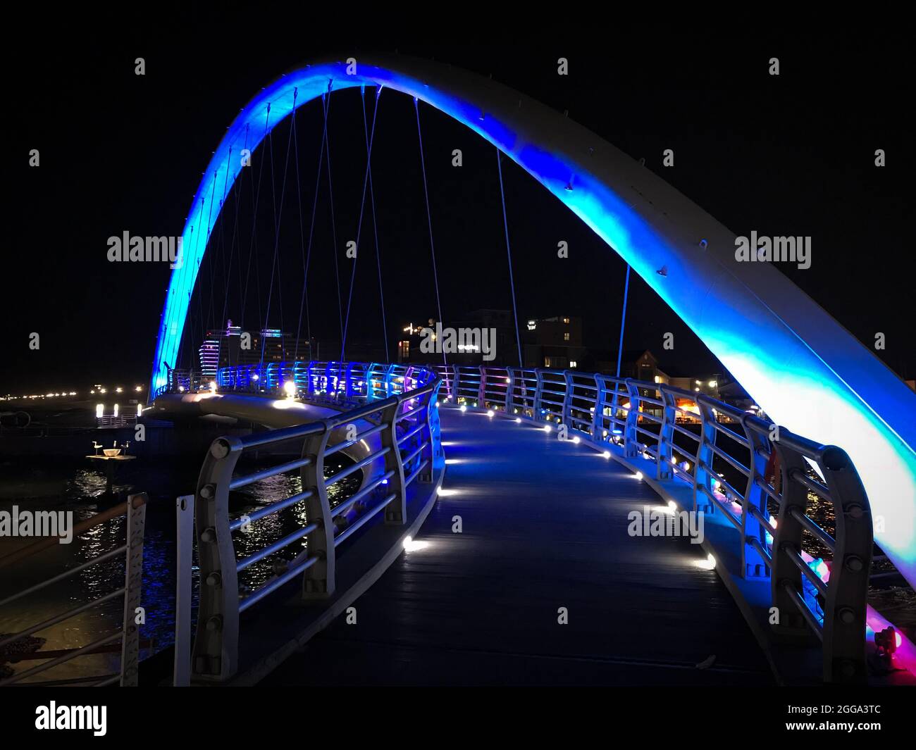 Gangneung, South Korea - February 18, 2018: Blue illuminated Gangmun Sotdae Bridge at night Stock Photo
