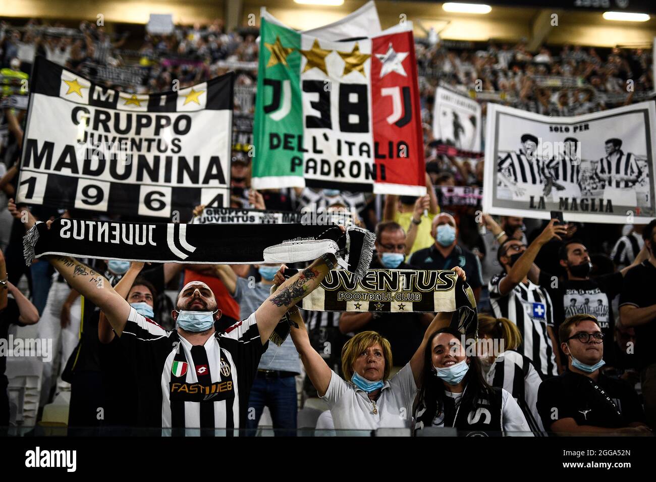 A Juventus soccer fan shows a scarf to remember the Heysel tragedy at the  King Baudouin stadium in Brussels, Sunday May 29, 2005. Fans from Britain,  Italy and Belgium marked the Heysel