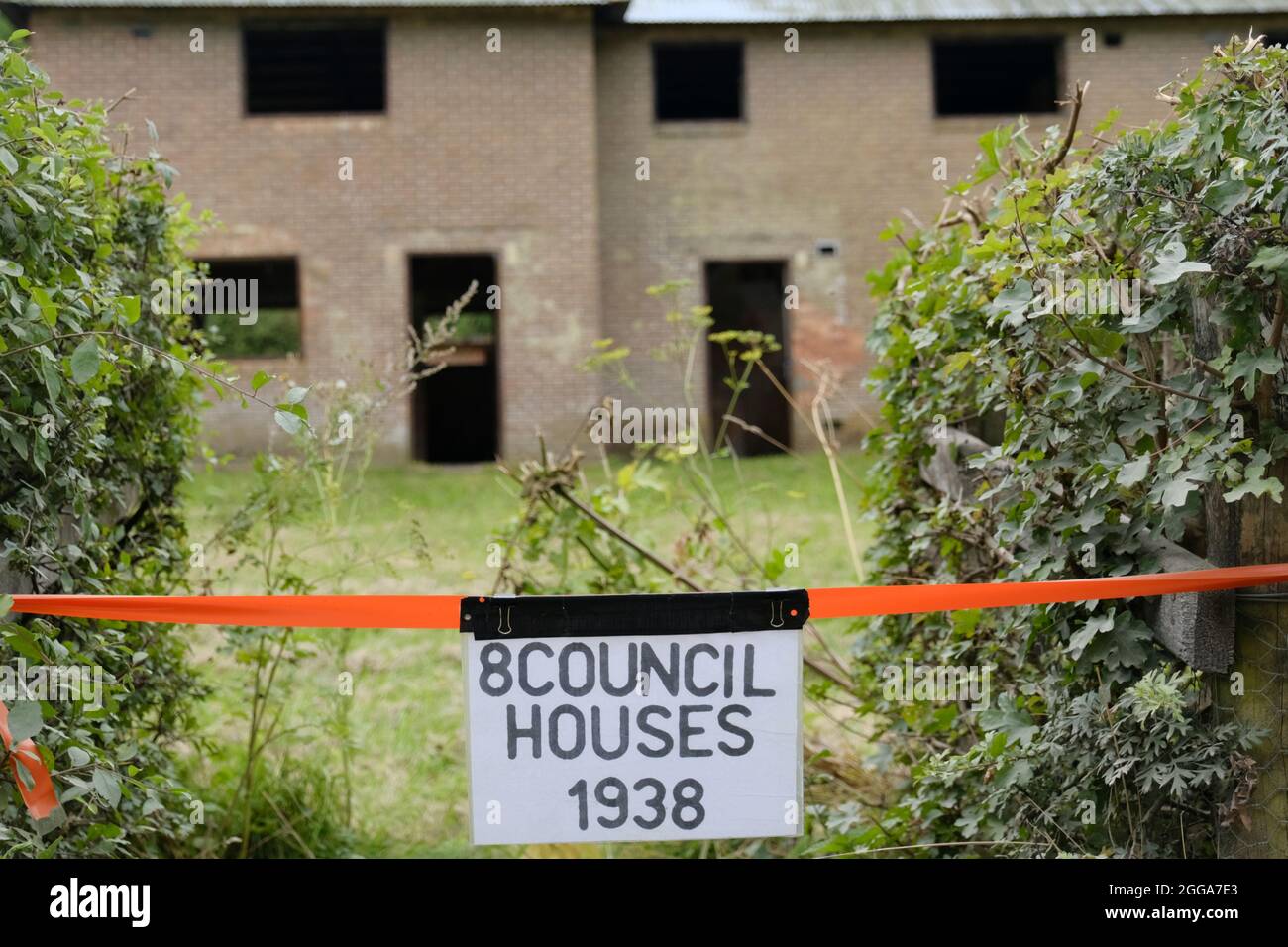 Imber, Wiltshire, UK. 30th Aug, 2021. Imber is an abandoned village on Salisbury Plain that has been used for Army training since 1943. The village was requisitioned in World War 2 with a promise that the villagers could later return; a promise that was not upheld. Some of the buildings are kept in a basic state of repair by the Army the exception is St Giles Church which is fenced off and is under the protection of the Churches Preservation Trust. It is the only building with glass in the windows. Credit: JMF News/Alamy Live News Stock Photo