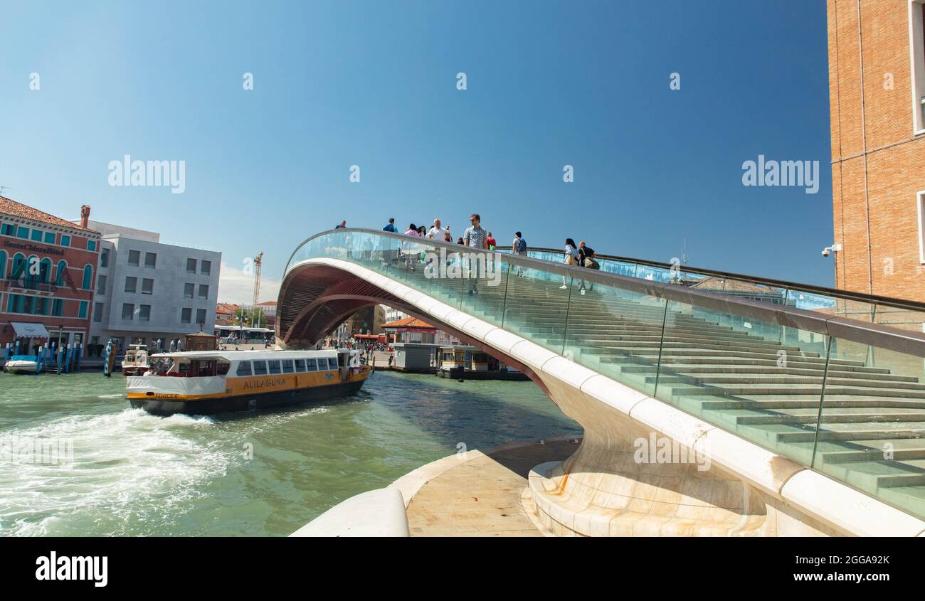 Ponte della Costituzione at Venezia during sunny day with walking tourists Stock Photo