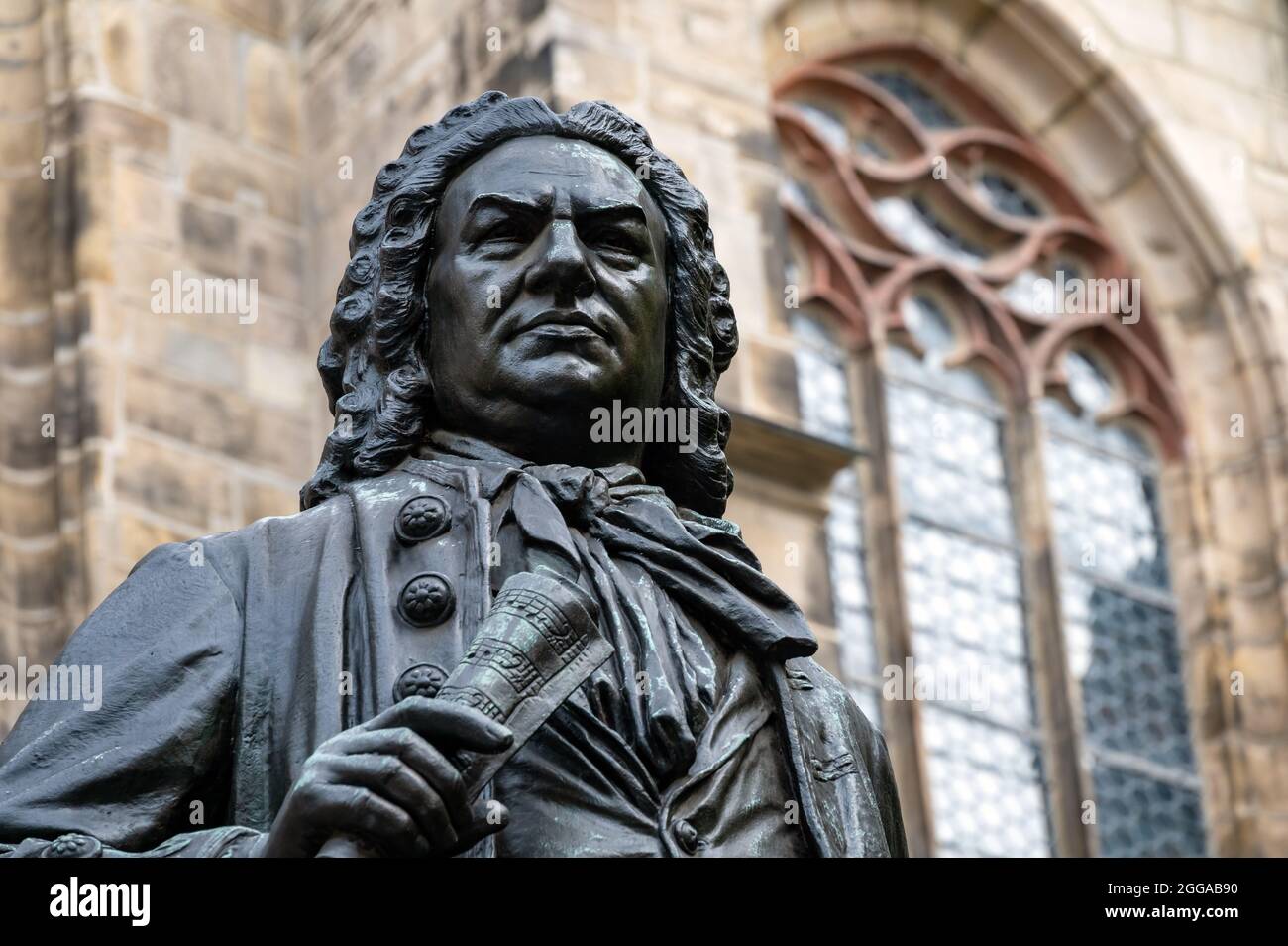Monument to the Thomaskantor and composer Johann Sebastian Bach in front of the Thomaskirche in Leipzig Stock Photo