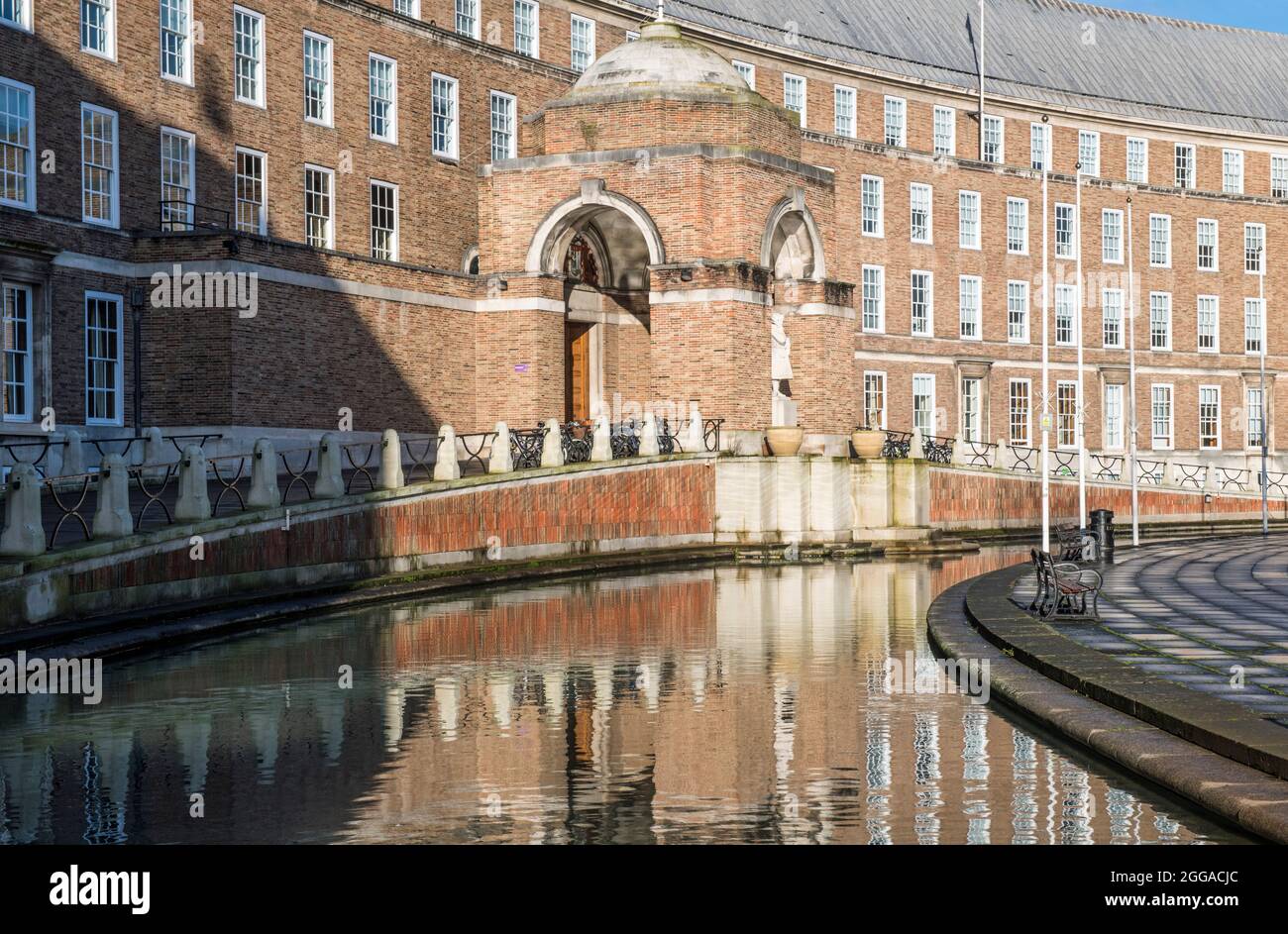 Bristol City Council Offices reflected in the pond around the building Stock Photo