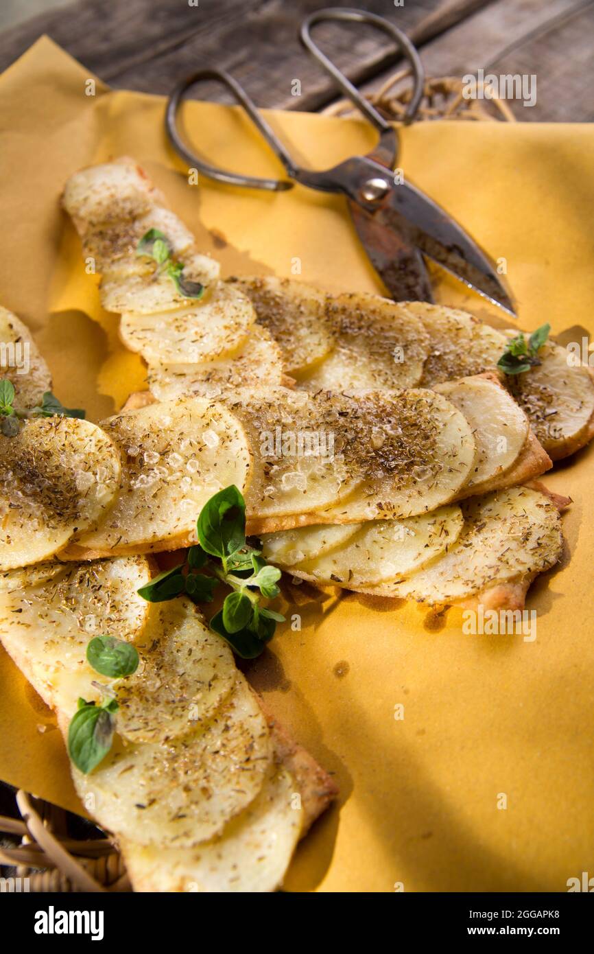 Cake of wheat flour with potatoes and rosemary Stock Photo Alamy