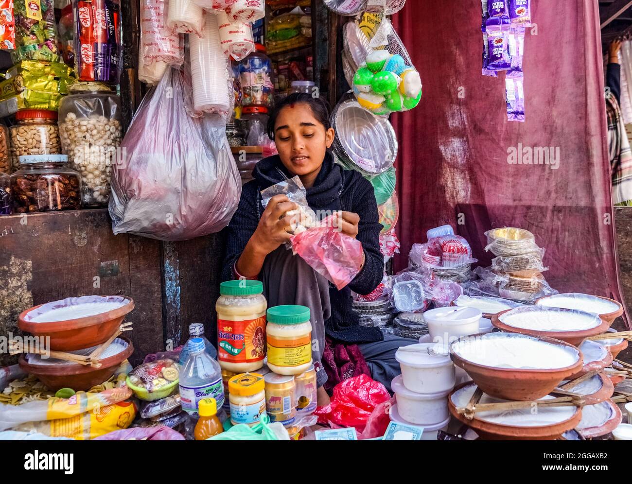 the yogurt seller, Nepalese girl selling yogurt and dairy products in a