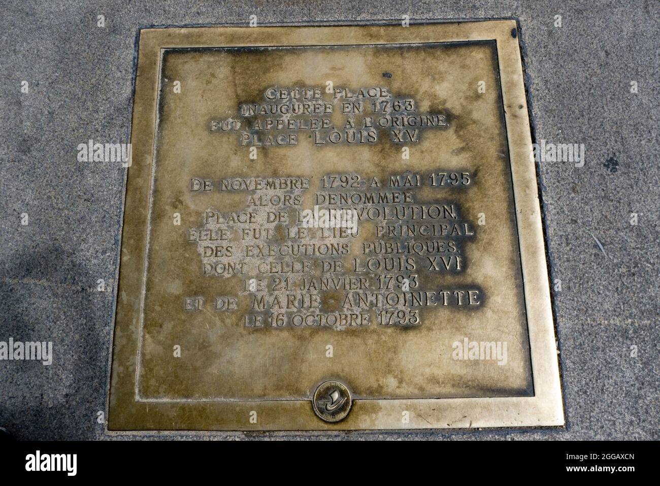 Plaque denoting Louis XVI and Marie Antoinette execution for treason at the base of the Obelisk in the Place de la Concorde Paris France Stock Photo