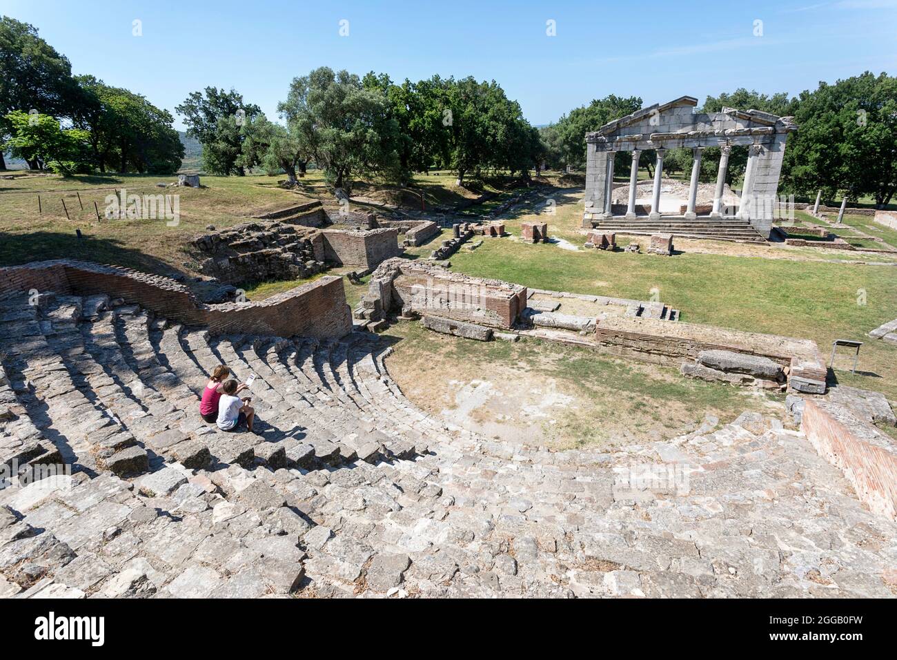 Mother And Son Exploring Ancient Greek Archeological Excavation Of Mother And Son Exploring Ancient Greek Archeological Excavation Of