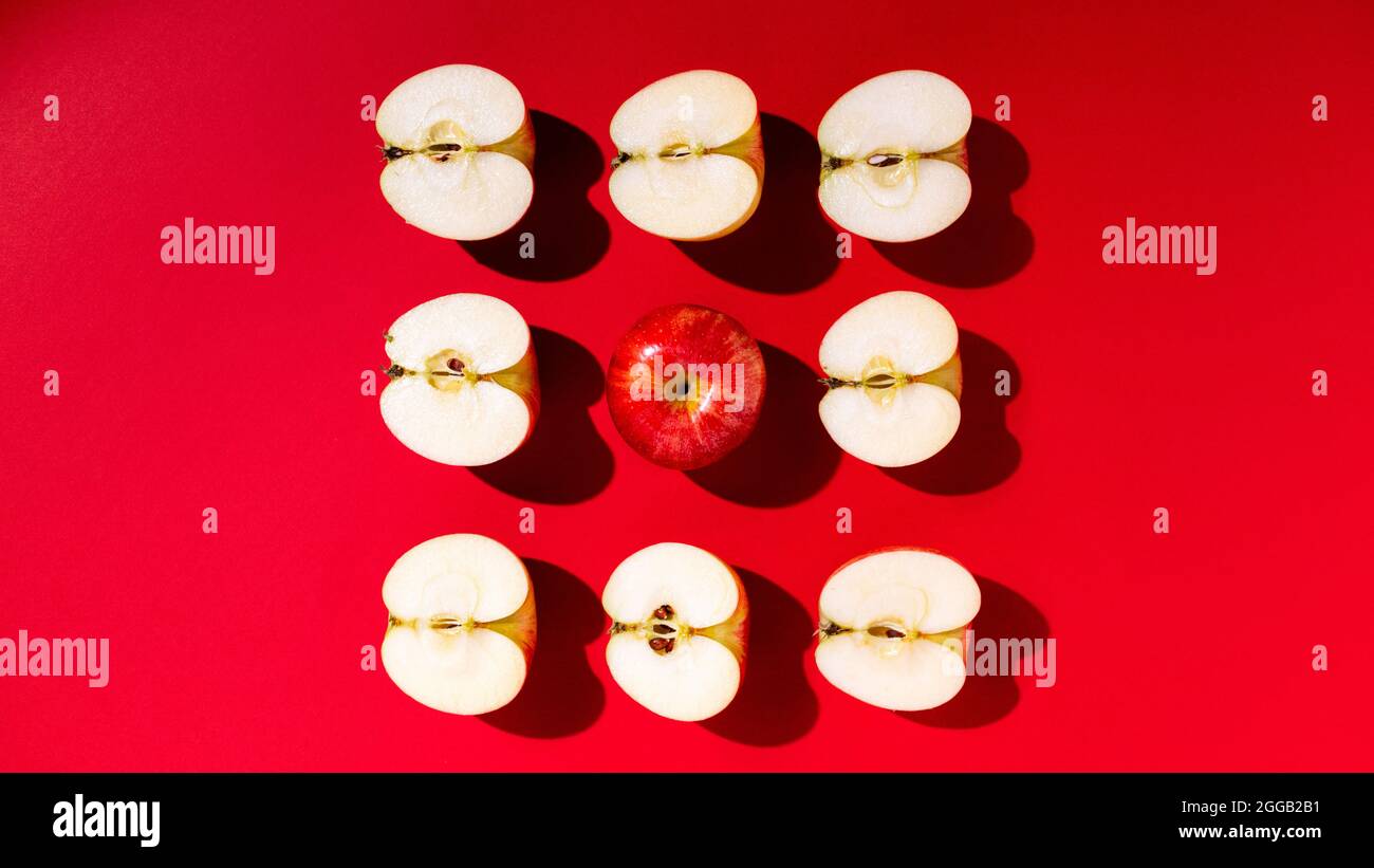 Large fresh red apple on red background gala schnico brookfield mema