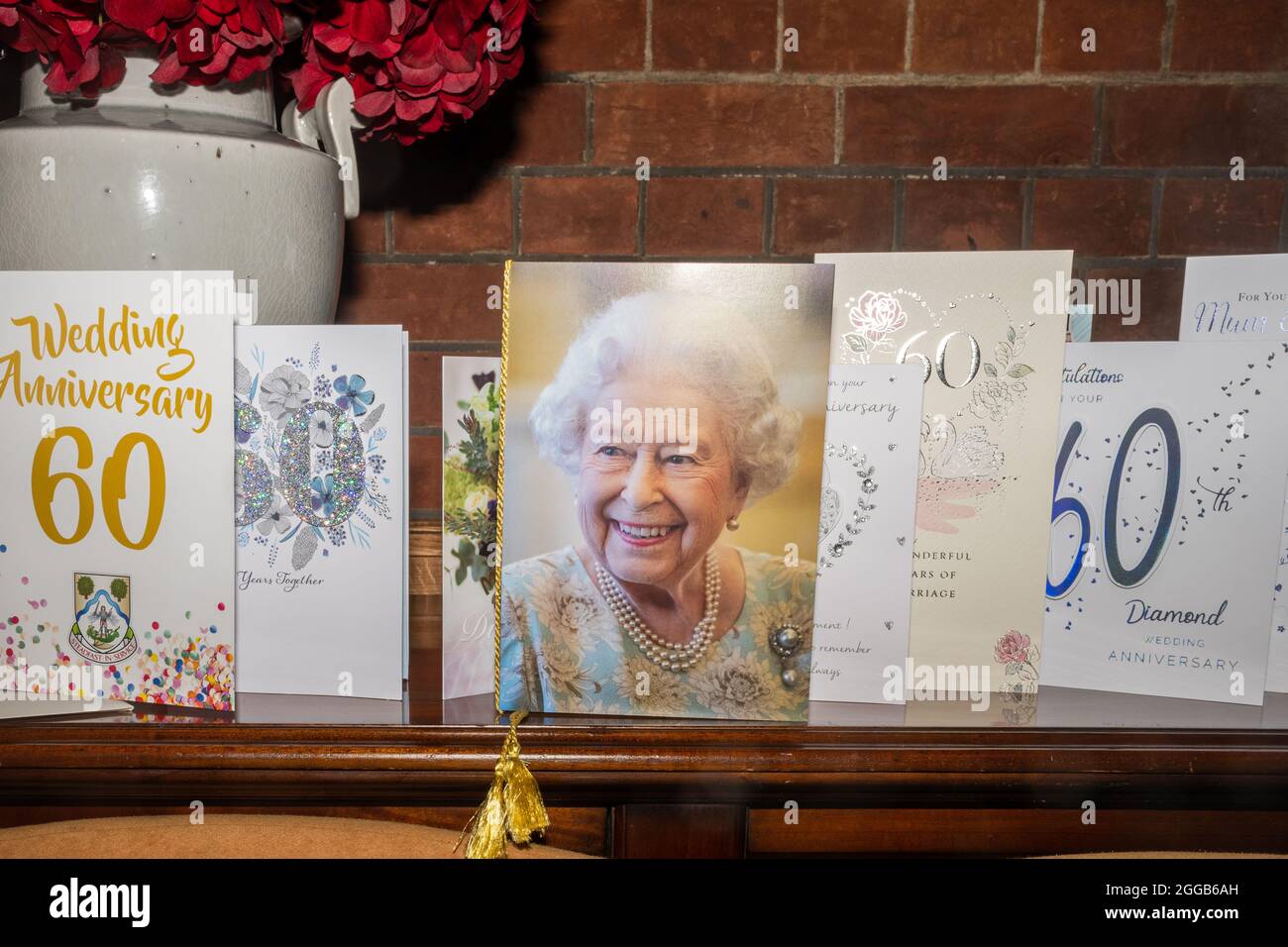 Display of 60th or Diamond wedding anniversary cards including a card from the Queen, UK Stock Photo