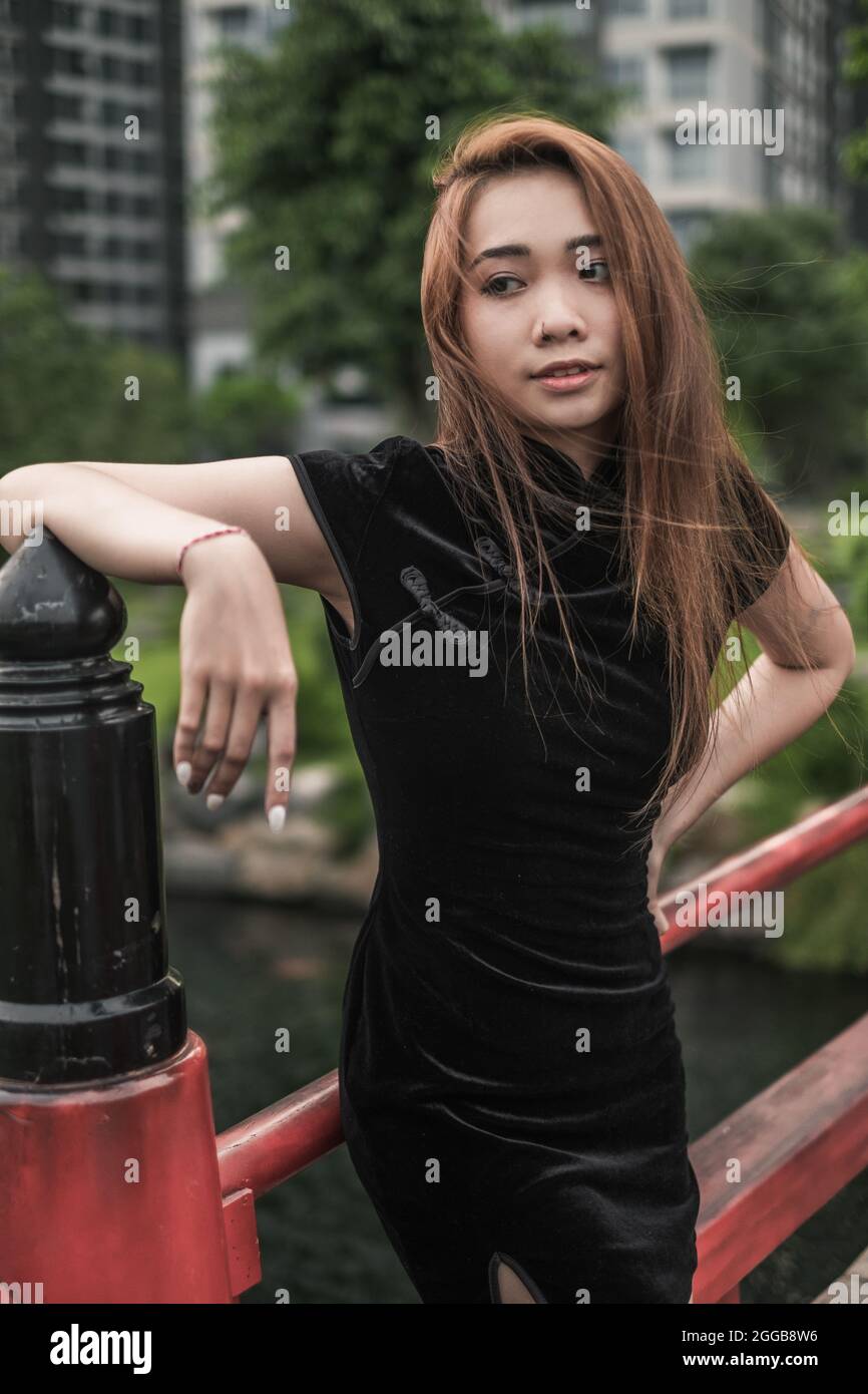 Portrait Of Beautiful Asian Girl In Casual Black Dress Standing In The Park Lovely Look Pretty 
