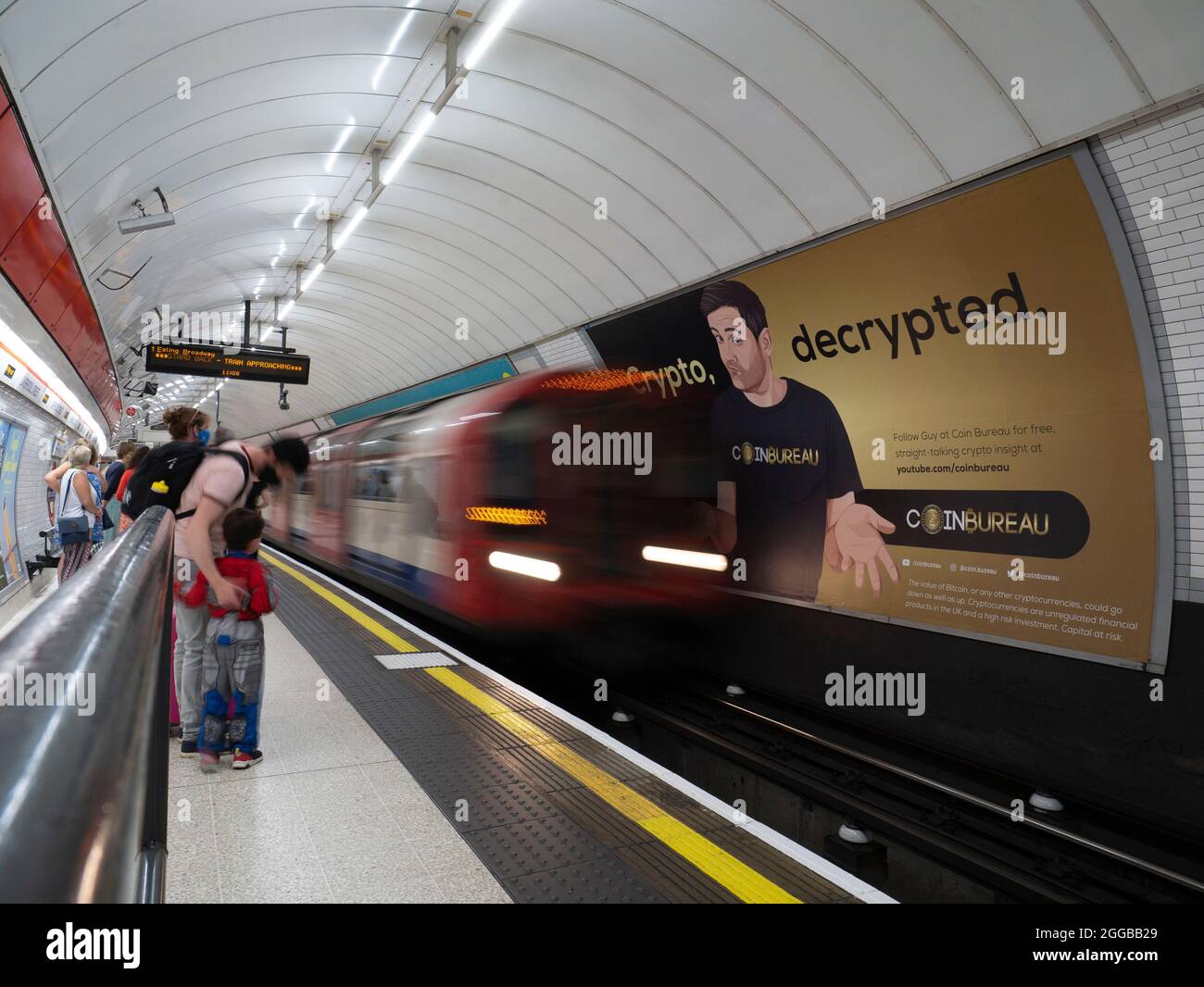 Crypto currency advertising on TFL London tube station for Coinbureau a popular cryptocurrency influencer Stock Photo