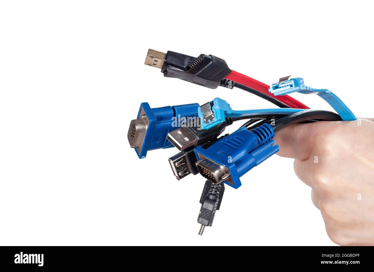 Bunch of computer cables in women's hand isolated on white background