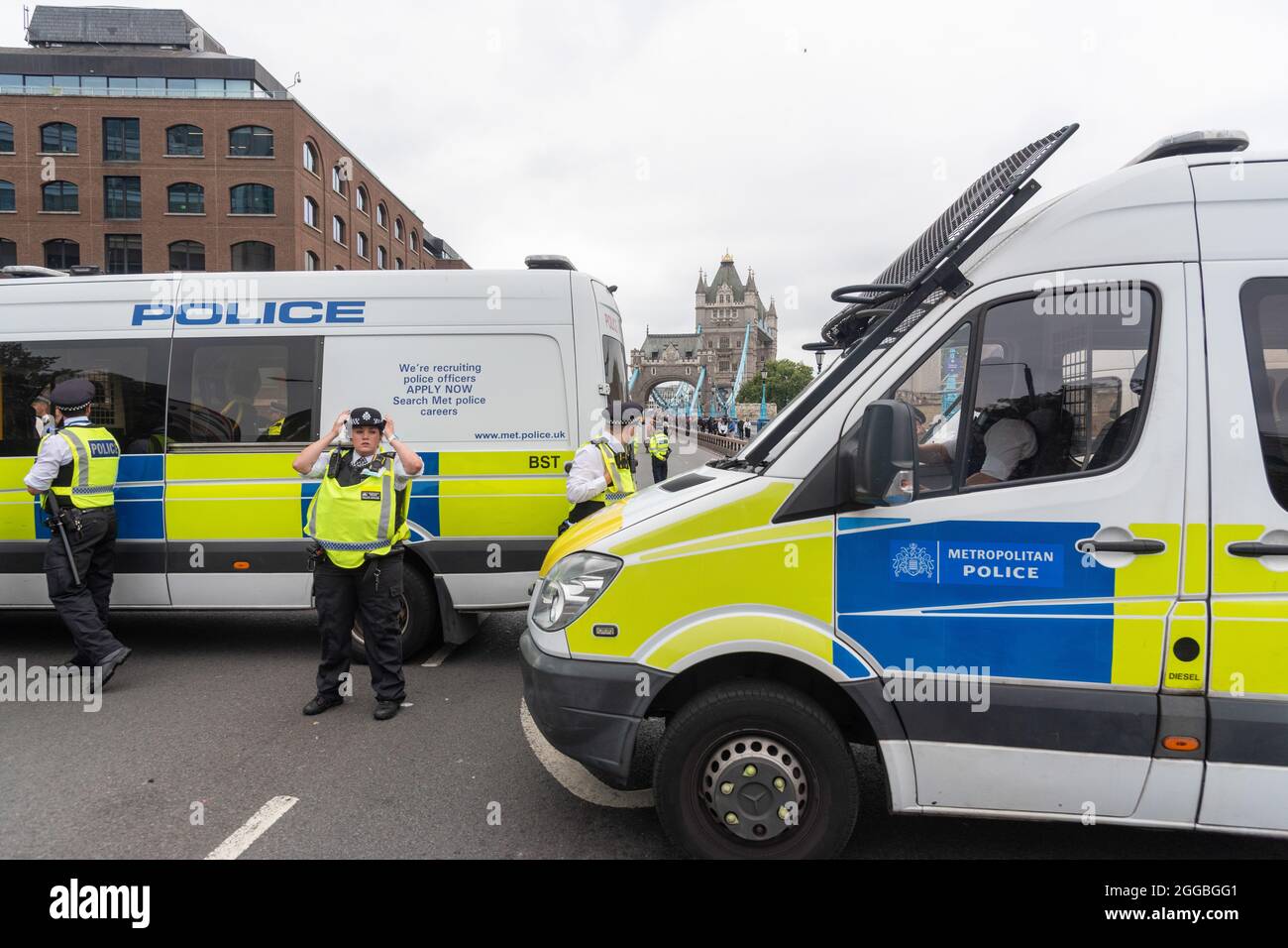 Police vans and officers block access to Tower Bridge in London to ...