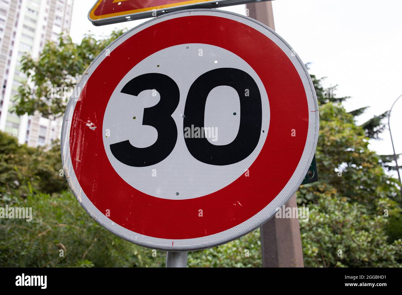 30 KM/H sign in the center of Paris, France. As the mayor of Paris has ...