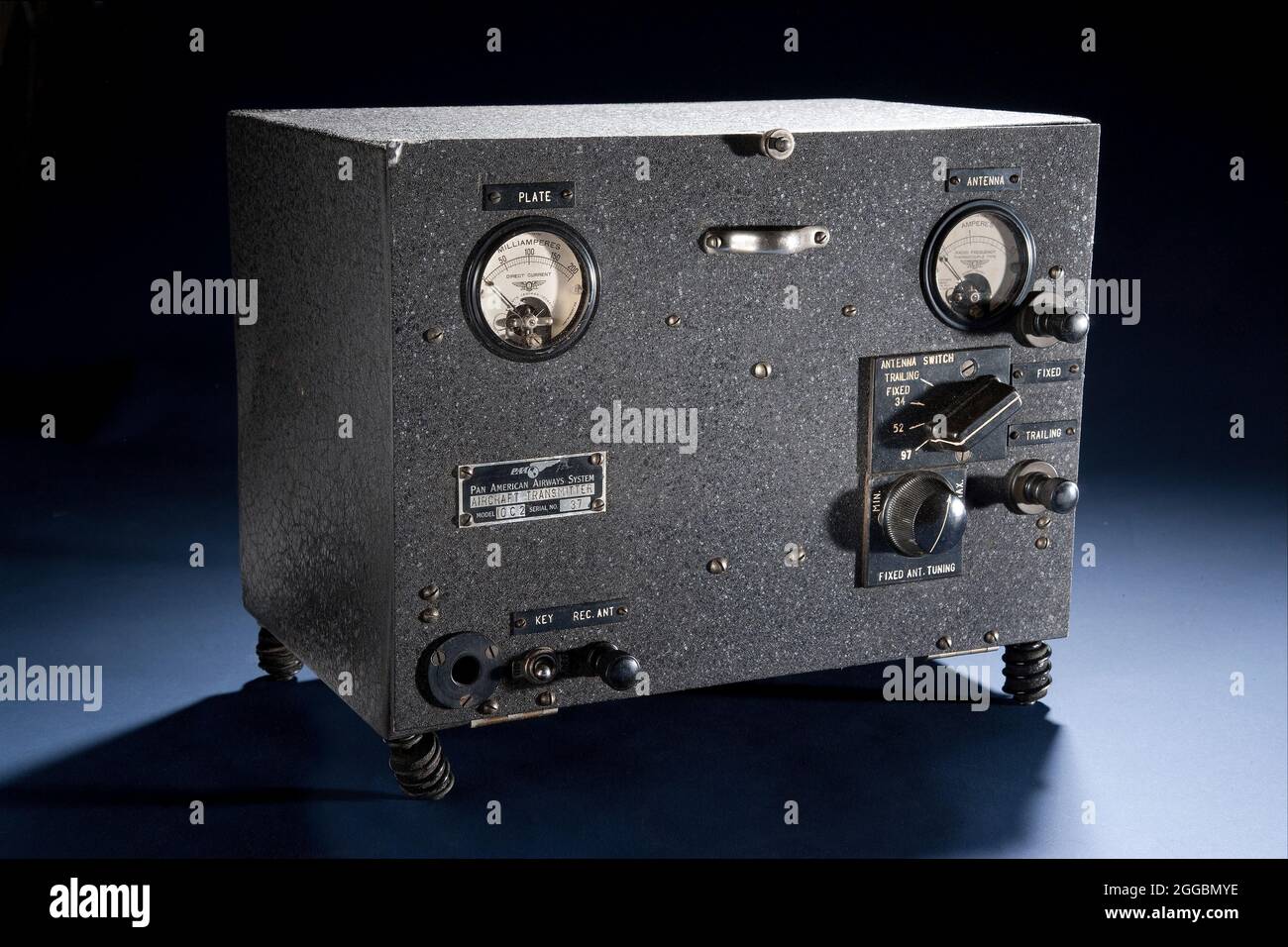 Black box mounted on springs. Two gauges one mounted in each upper corner. Upper left gauge is milliamperes with &quot;Plate&quot; labelled above the gauge. The upper right gauge is amperes and has &quot;Antenna&quot; labelled above. Several knobs and switches. Charles Lindbergh and his wife, Anne Morrow Lindbergh, took this transmitter and other radio equipment on their 1931 flight to the Orient and 1933 survey flights across the North and South Atlantic. Because they were flying over vast stretches of unchartered territory in Canada, Alaska, and Siberia during their 1931 flight and Greenland Stock Photo