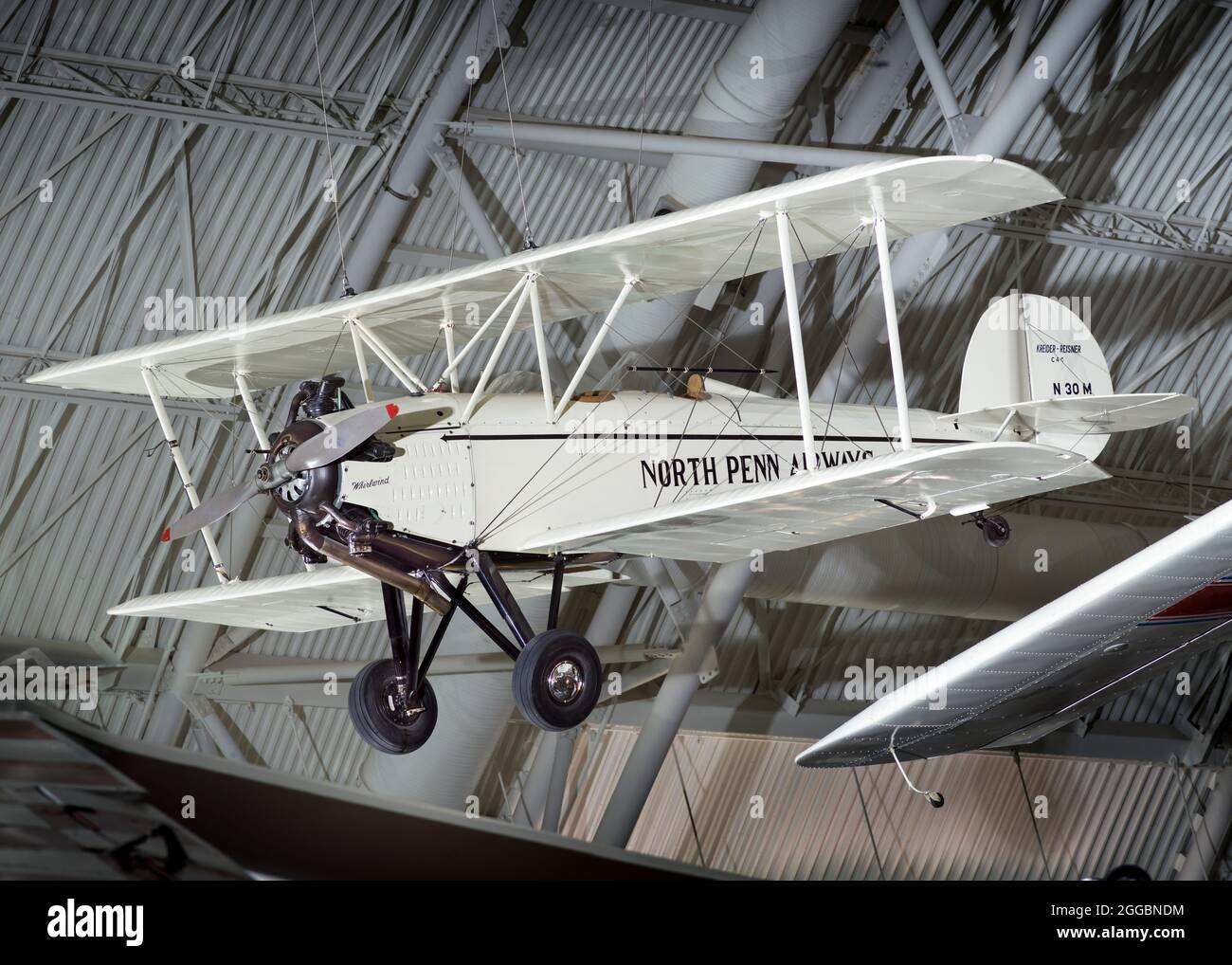 Off-white, black trim; Wright J-6, 150 hp single-engine, 3-place biplane. Amron Kreider and Lewis Reisner of Hagerstown, Maryland, built the Kreider-Reisner C-4C Challenger, a light and efficient biplane, as a replacement for aging Curtiss Jennys and Standards. Beginning in 1926, Kreider-Reisner built a series of three-place, open-cockpit aircraft that flew exceptionally well. The addition of a Wright J-6 engine made the design especially reliable. In April 1929, Kreider-Reisner became a subsidiary of the Fairchild Airplane Manufacturing Company, which redesignated the C-4C Challenger line as Stock Photo