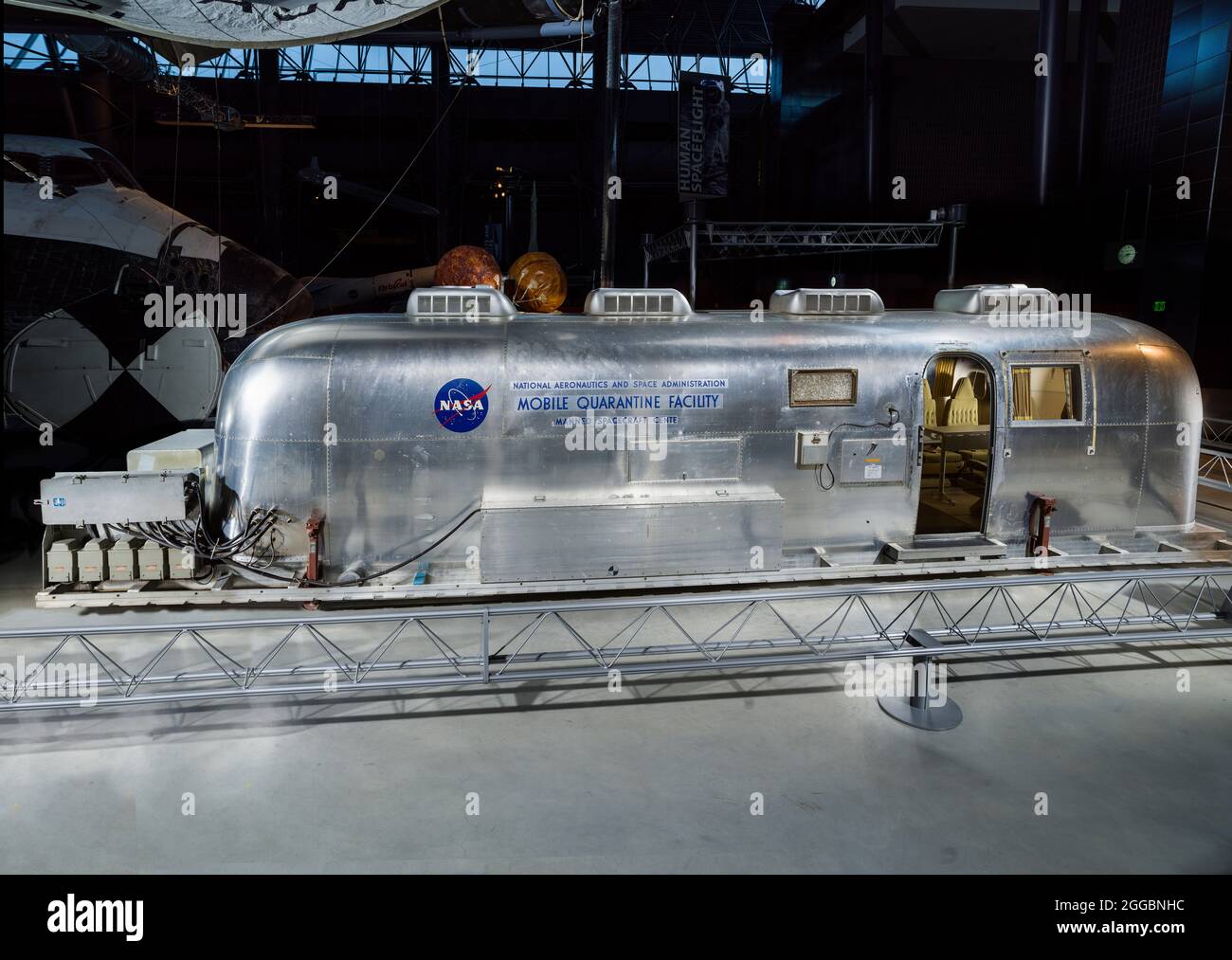 This Mobile Quarantine Facility (MQF) was one of four built by NASA for astronauts returning from the Moon. Its purpose was to prevent the unlikely spread of lunar contagions by isolating the astronauts from contact with other people. A converted Airstream trailer, the MQF contained living and sleeping quarters, a kitchen, and a bathroom. Quarantine was assured by keeping the air pressure inside lower than the pressure outside and by filtering the air vented from the facility. This MQF was used by Apollo 11 astronauts Armstrong, Aldrin, and Collins immediately after their return to Earth. Stock Photo