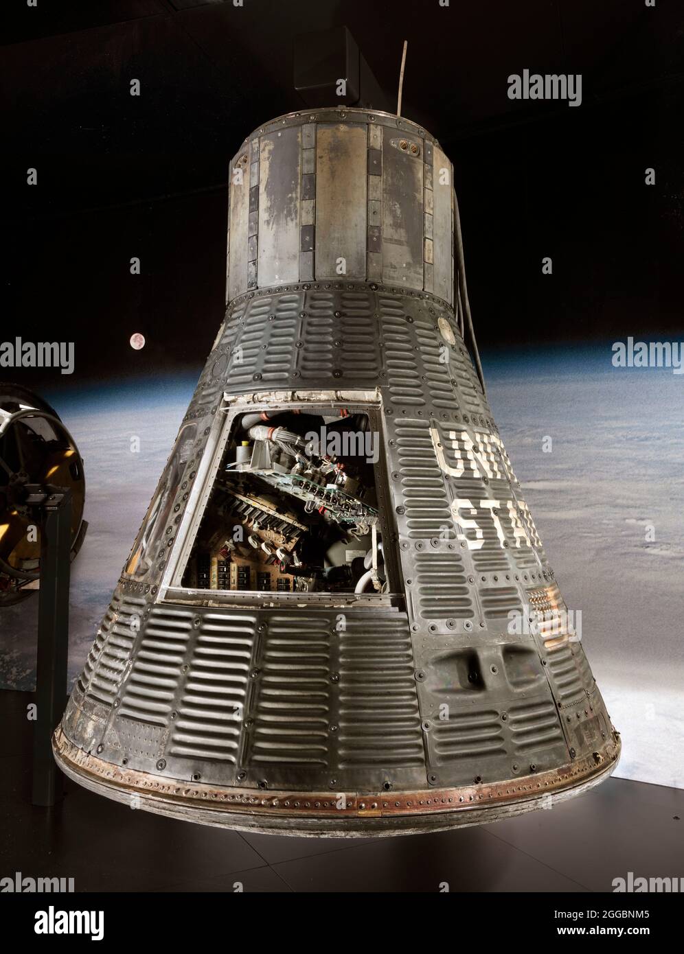 In this historic capsule, John H. Glenn Jr. became the first American to orbit the Earth. Glenn's flight was the third manned mission of Project Mercury, following two suborbital flights by astronauts in 1961. Glenn's three-orbit mission on February 20, 1962, was a sterling success, as he overcame problems with the automatic control system that would have ended an unmanned flight. But reentry was tense, as a faulty telemetry signal from the spacecraft indicated that the heat shield might be loose. Mission Control instructed Glenn not to jettison the retrorocket package after firing in order to Stock Photo
