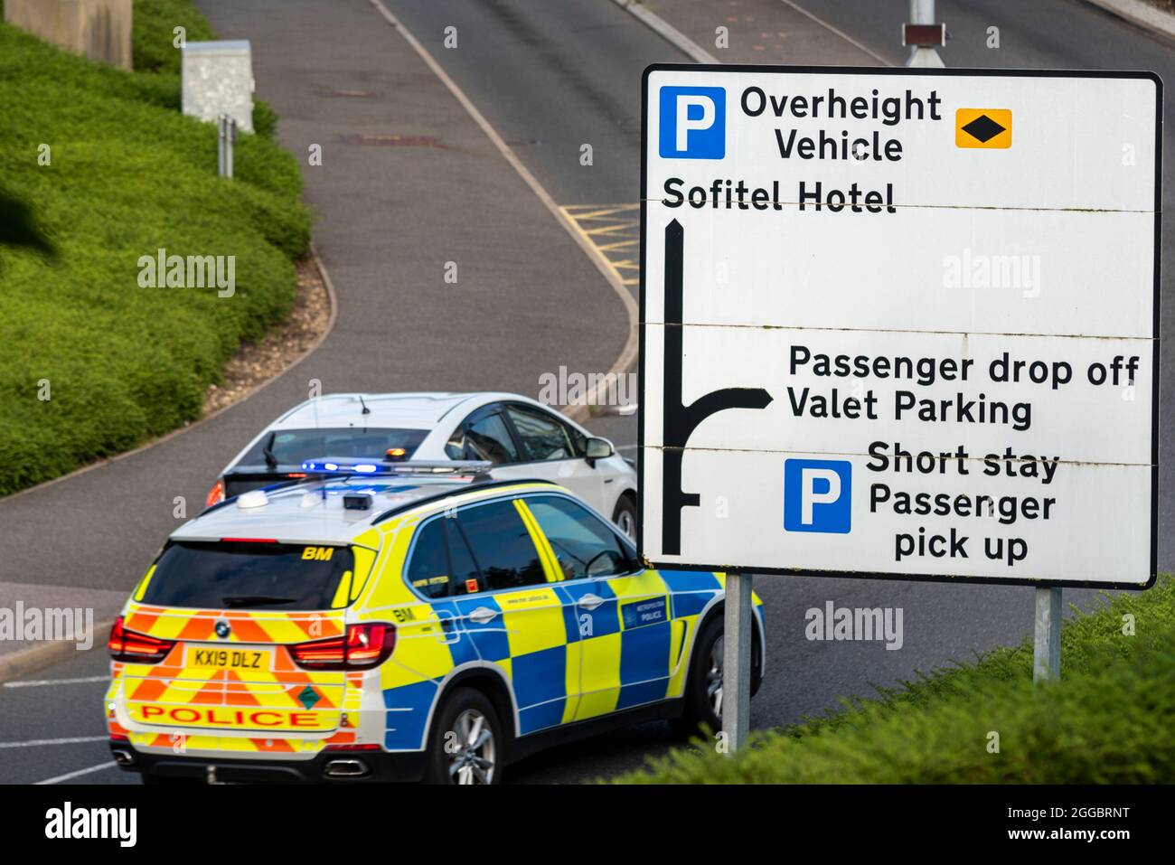 Police car responding to an incident at London Heathrow Airport, UK. Reported to be passenger being violent aboard an arriving flight Stock Photo